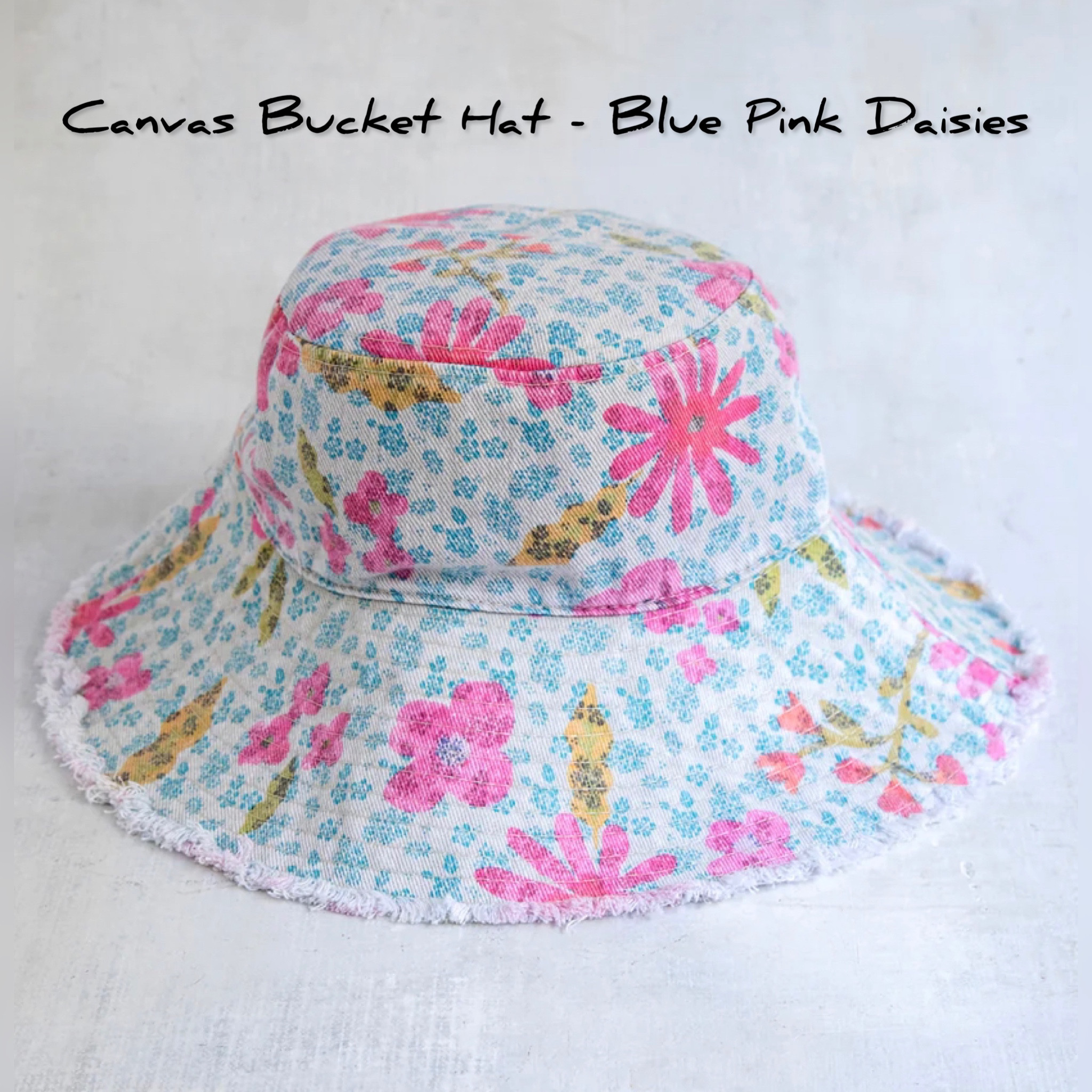 Protect your face from the harsh summer sun but look super cute the entire time! This printed Bucket Hat features a raw edge and adorable daisies that will brighten up even the brightest of summer days! The inner band is adjustable so you can customize it to fit you best! You can even fold it up and pack it in your suitcase for easy traveling on vacation. Protect your sensitive scalp and face when you’re on the beach or just when you’re out in your backyard. You might just wear it because it’s the perfect accessory for your outfit! Fun summer memories are waiting for you and the hat just makes them more fun!

#LTKsalealert #LTKFind #LTKtravel