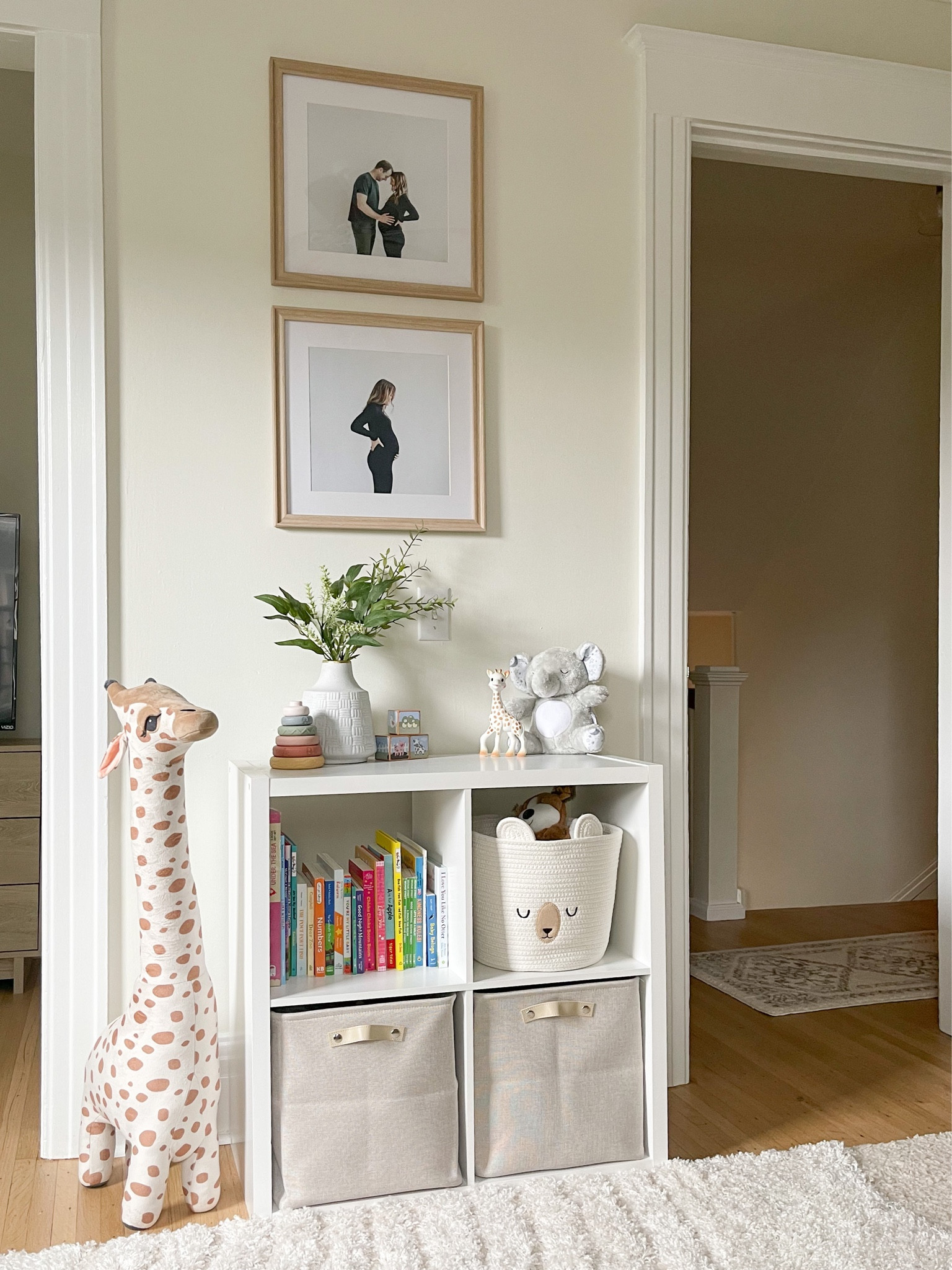 Neutral modern nursery 
Giraffe stuffed animal large
Bookshelf styling
White paint, Swiss coffee by Benjamin Moore
Home decor

#LTKbaby #LTKhome
