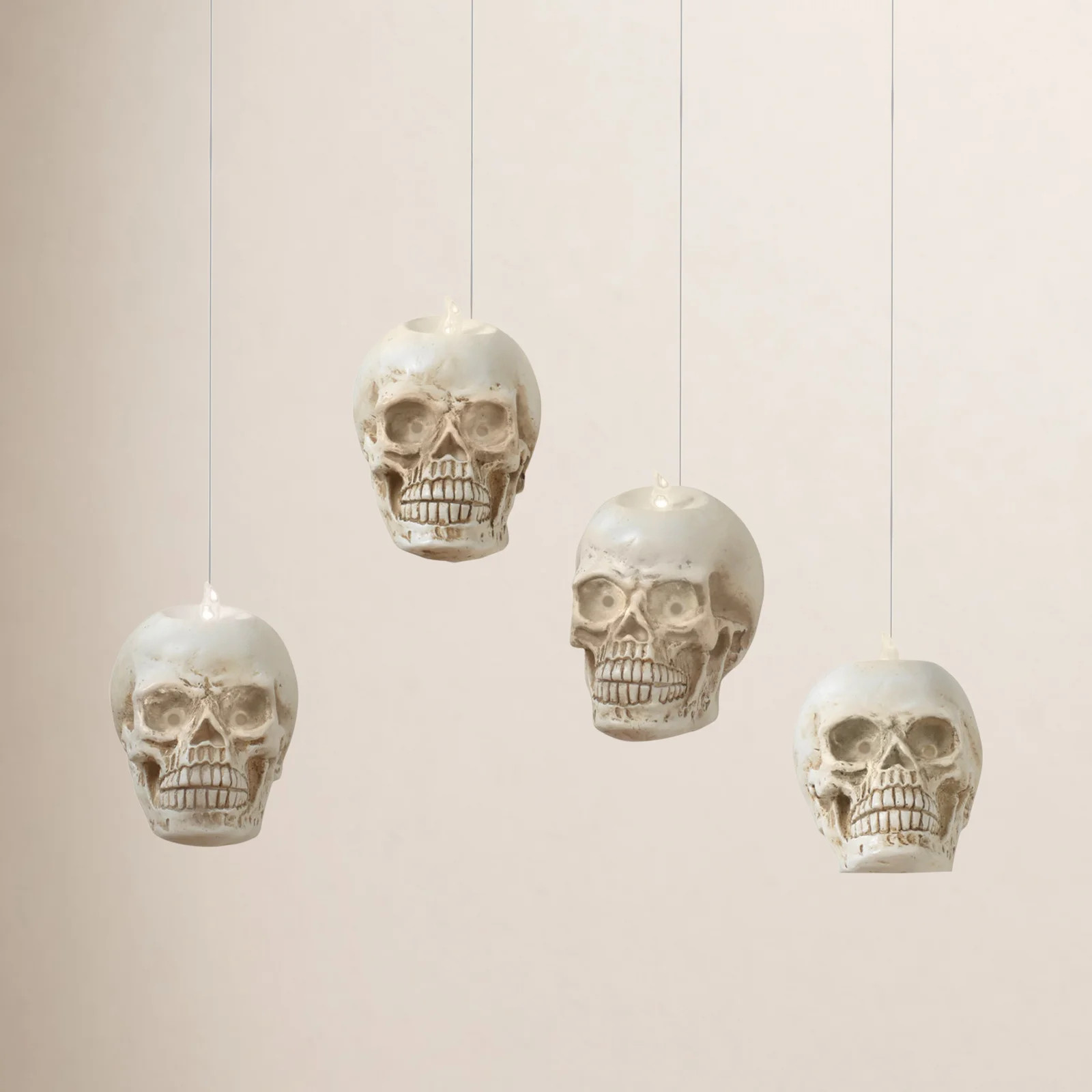 Lighted Hanging Skulls Set of 4 with Remote & Timer 4.6"H | Wayfair North America