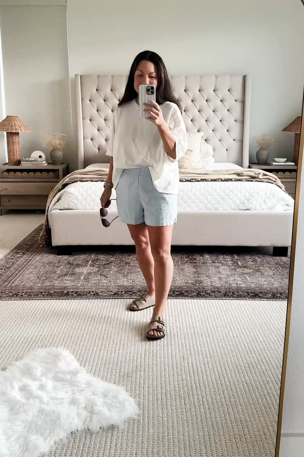 Easy everyday summer outfit I’ve been reaching for on repeat lately 🤍 Lightweight tee, comfy elastic waist linen shorts, and neutral slides that go with everything—perfect for slow mornings at home or quick errands out. Everything is super wearable and easy to mix into your summer wardrobe.

Sizing: wearing my usual size in everything (shorts are a great relaxed fit without being too oversized).

Follow me on LTK for daily outfit ideas, home decor, and affordable finds 🤍

#LTKdayinmylife #LTKootd #LTKSeasonal