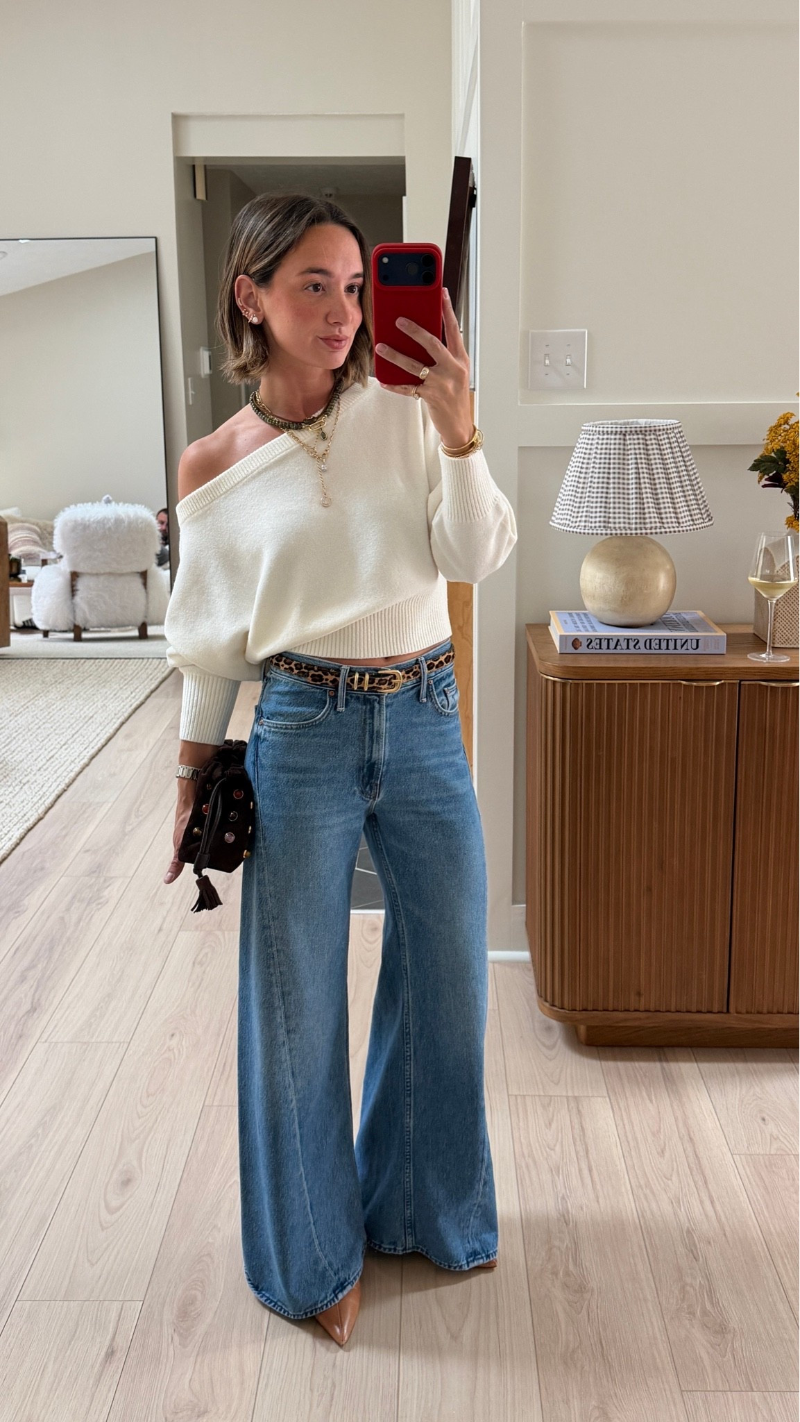 Date night! Small sweater 24 petite jeans. Pouch is old Veronica Beard🤎