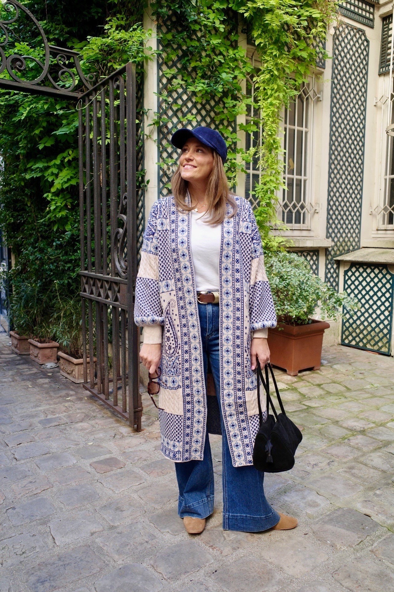 This patterned duster is such a fun statement layer for fall. I styled it with a classic white tee, wide leg jeans, and suede flats for an easy casual outfit. The baseball cap adds a relaxed touch that keeps the whole look laid back! 

#LTKSeasonal #LTKMidsize #LTKOver40