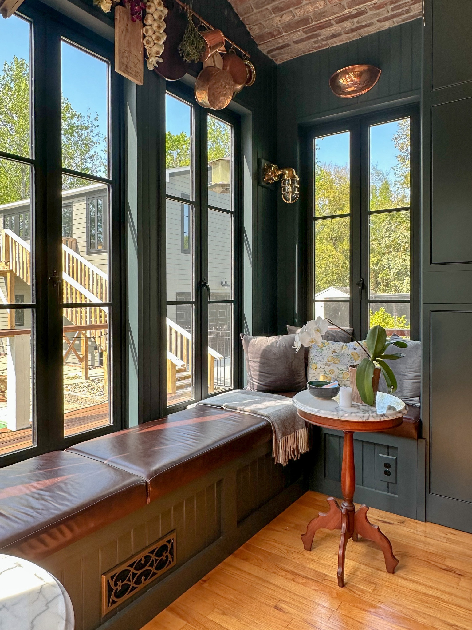 Forget about the dine-in kitchen or the bar with stools and carve out a cozy corner for banquette seating with cushions.  This is the ultimate cozy nook with a view!  Create memories with afternoon cat naps and whispers over tea!

#LTKhome #LTKfamily #LTKSeasonal