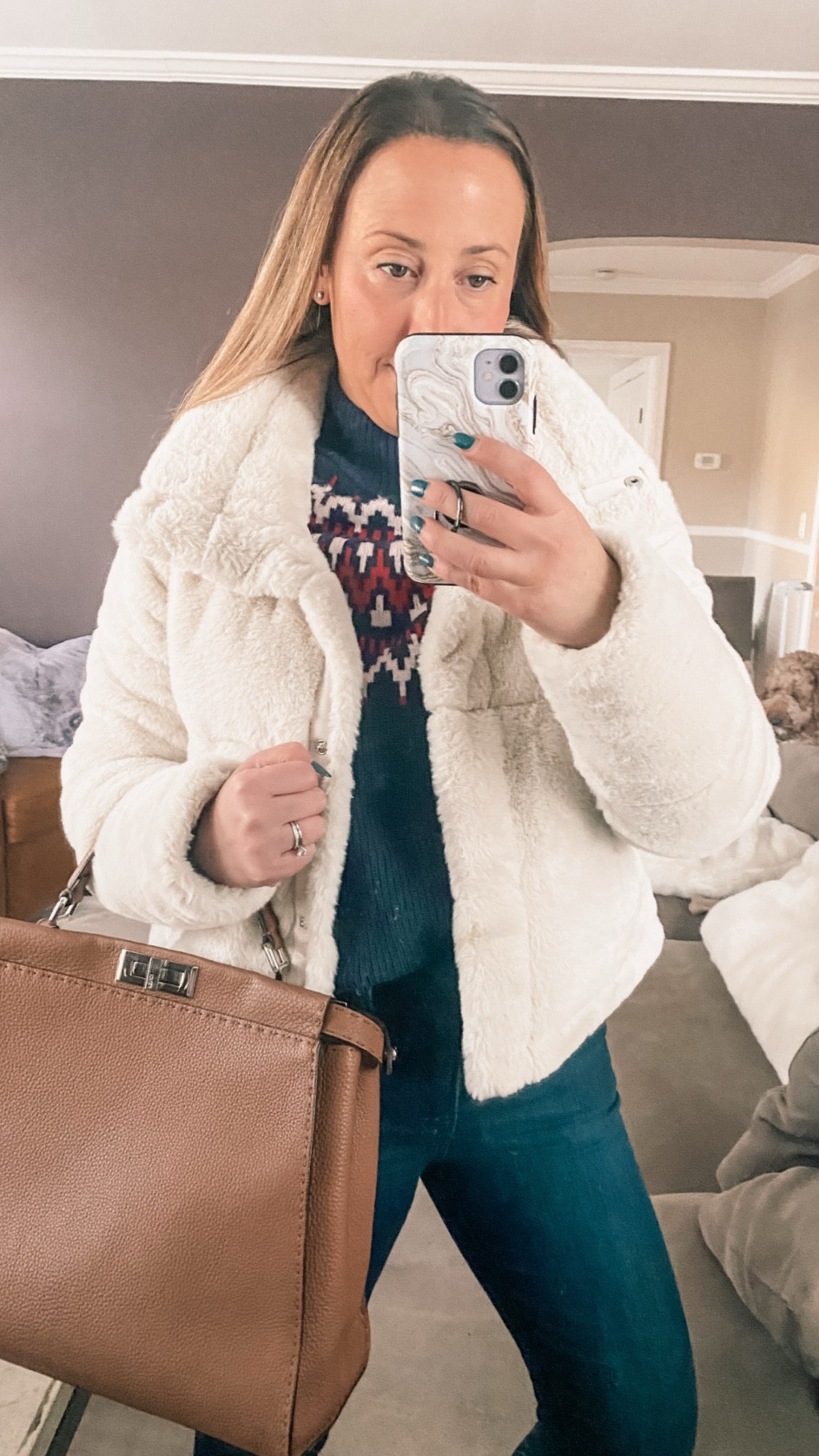 Winter outfit  athleisure  Gifts for her. Gift guide for her. faux fur jacket. Wool sweater. Casual winter style. Jeans. Mocha color handbag. Winter vacation outfit  

#LTKWorkwear #LTKSaleAlert #LTKSeasonal