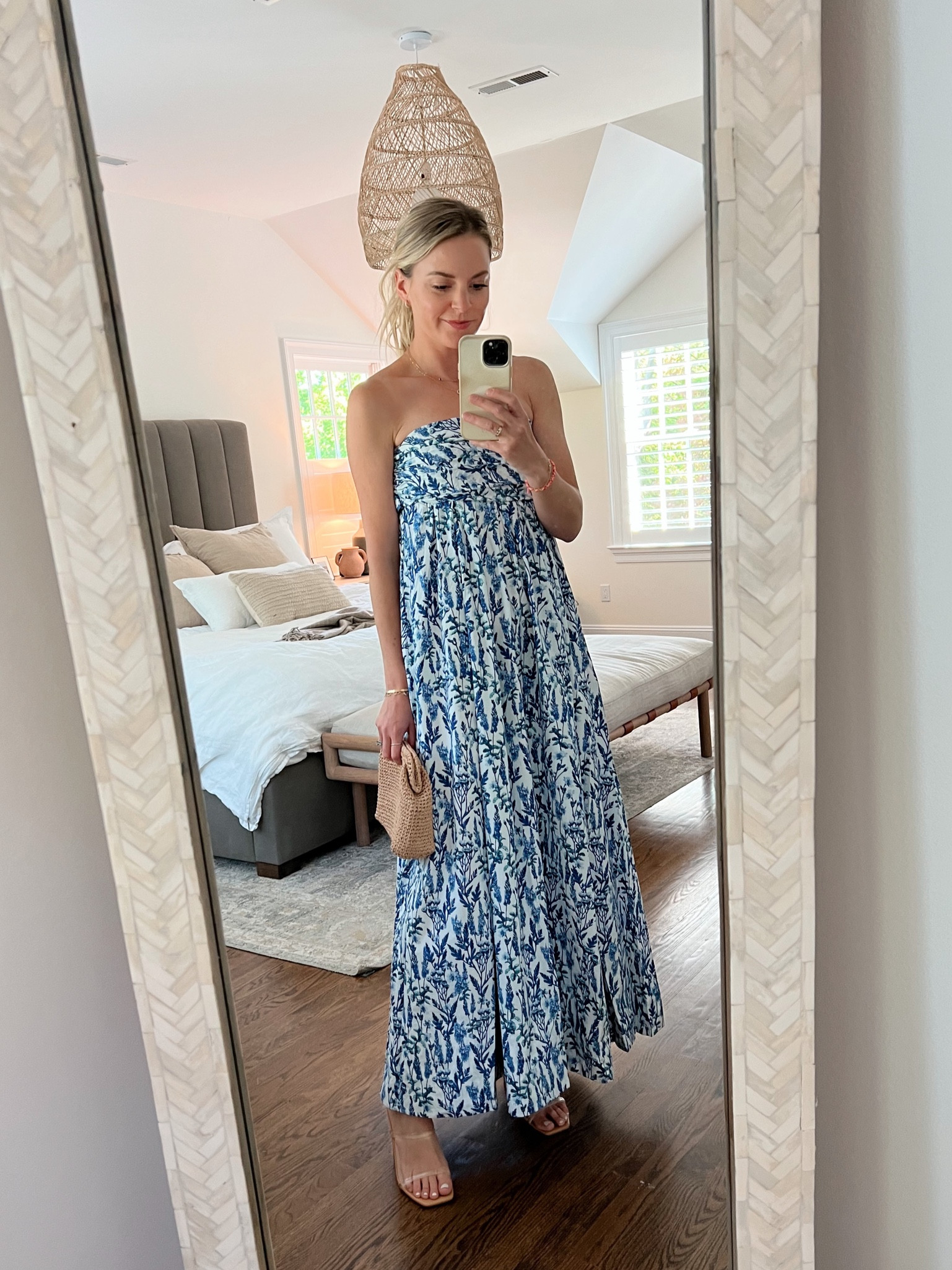 strapless floral dress with a big bow back detail. perfect for a summer wedding. wearing a 0



#LTKwedding