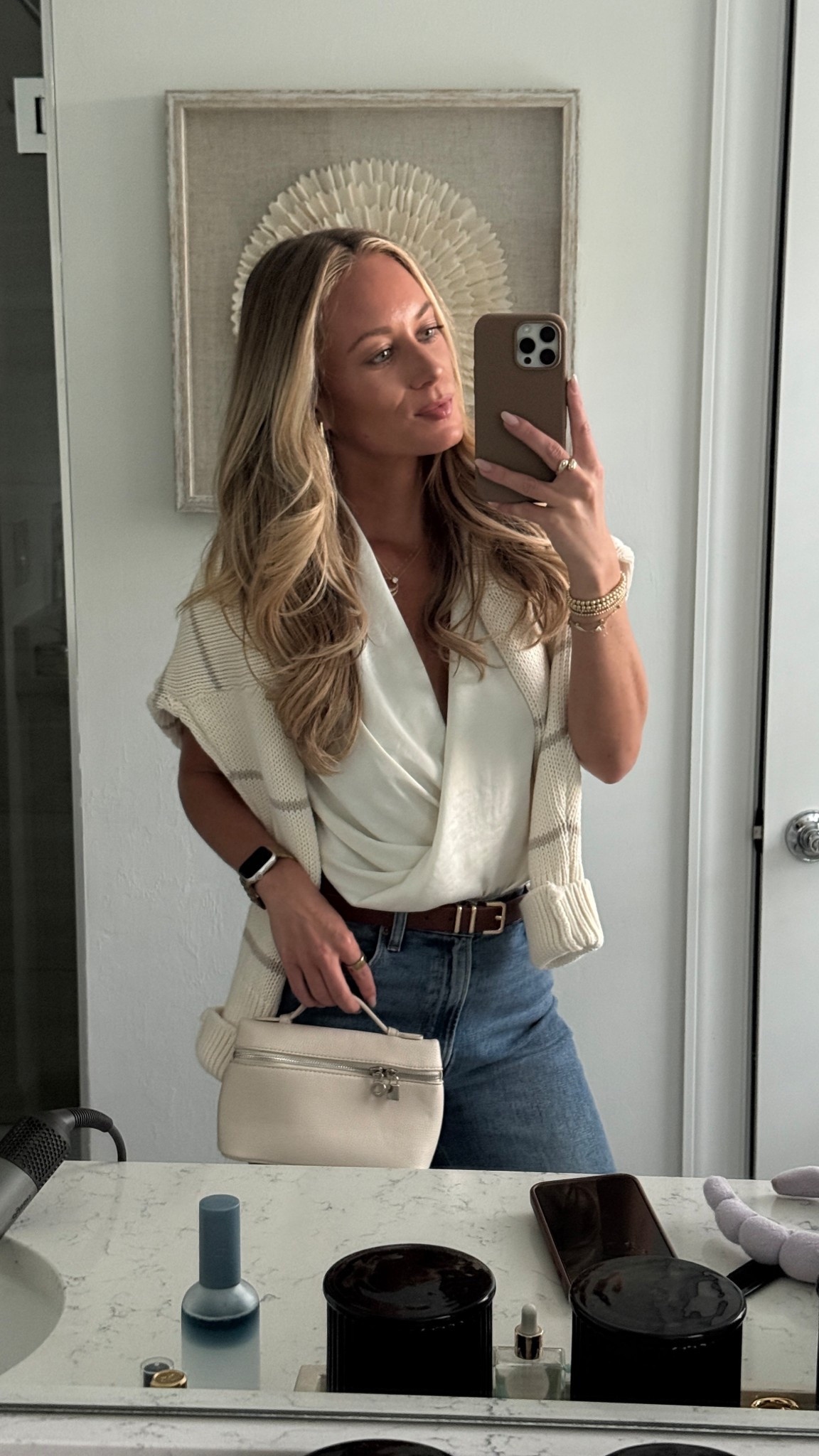 Dinner out of the night - satin halter top from Aritzia (small) with a cotton striped cardigan and one of my go to @abercrombie jeans! 

#LTKootd #LTKgrwm