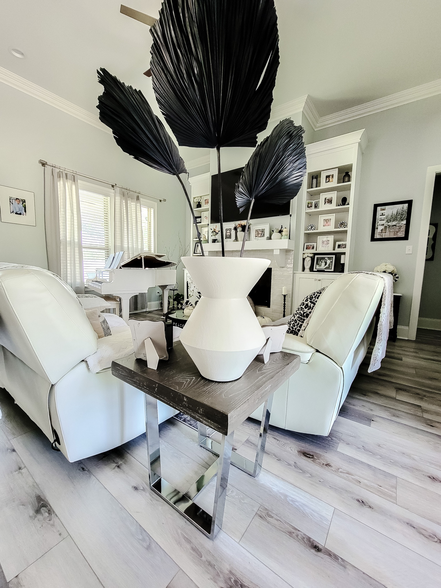 Lovely white vase and large faux palms in black. Home decor add ons lately, from West Elm, but now is sold out, so I have linked them on other sites. Love oversized pieces !

#LTKunder100 #LTKunder50 #LTKhome