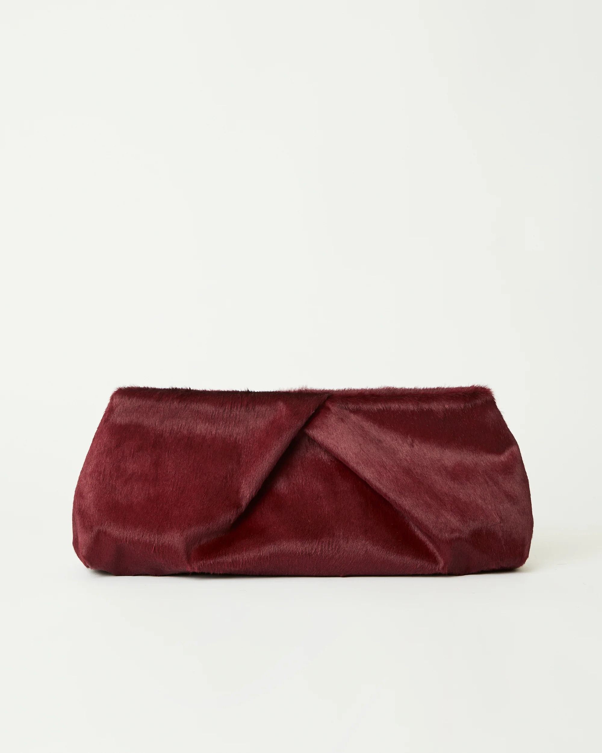 JINO CALF-HAIR CLUTCH | B-Low The Belt