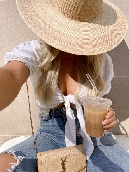 Summer chic! Wearing a size S in the #abercrombie linen tie crop top, a size 27 in the #agolde jeans (size down for more form fitting look- I stayed TTS for relaxed look) and paired with my favorite #lackofcolor straw hat and #ysl raffia purse! 

#LTKsalealert #LTKstyletip #LTKSeasonal