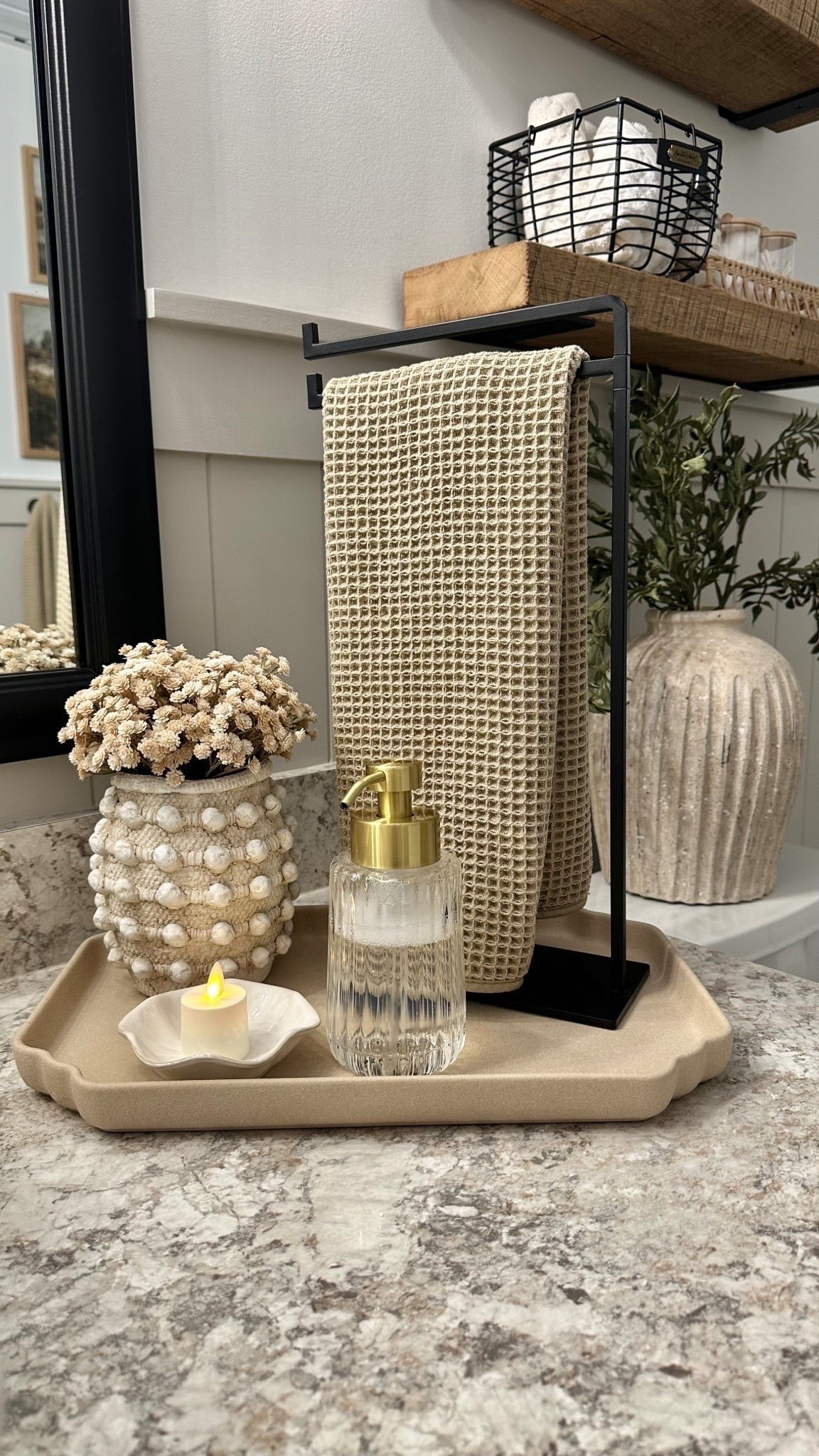 ✨I can’t believe it’s from Amazon! Follow @farmtotablecreations on Instagram for more inspiration.

How incredibly cute is this textured vase I found on Amazon? It’s a major designer look alike of a more expensive brand. I’m so impressed with the quality and it can be used anywhere.

I added some cute neutral stems and displayed it here in the bathroom. It fits perfectly on this tray and adds the best texture to this space.

For Reference: 
Vase is comparable in size to the Minka XS vase. 
9 stems shown in Amazon vase.
Weathered Vase on toilet tank is size small and has 3 stems.

Amazon Prime | Amazon | Amazon Home Finds | Loloi Rugs | Bathroom Decor | Bathroom Storage | Amazon Must Haves | Bathroom Shelves | Home Decorating | Decor Ideas | Budget Friendly Decor | Home Inspiration | Amazon Spring Sale | open shelves | Small Spaces | Bathroom Shelves | Small Bathroom Storage | Home Decor | Neutral Bathroom Decor | Loloi Rugs | Master Bedroom | Spring Decor | Spring Refresh | Living Room