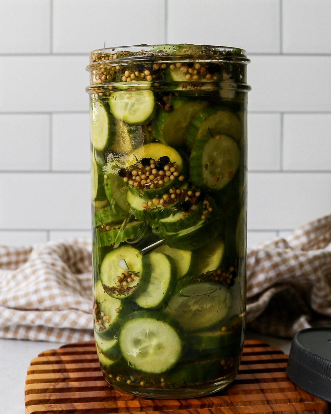 Everything you need to make these Refrigerator Dill Pickle Chips is right here. The Ball wide mouth mason jars are the perfect size for this recipe and the leak proof plastic lids are so much easier to use than standard metal lids for refrigerator pickles since they are reusable and rust free. The Our Place Mini Perfect Pot is ideal for making the small batch brine and the OXO angled measuring cup and measuring spoons make sure the brine ratios are exactly right every time. The Henckels paring knife set and OXO cutting board are perfect for slicing the mini cucumbers into perfectly even quarter inch rounds. Tap to shop everything I used to make this recipe! 

 #LTKdayinmylife #LTKfoodie #LTKHome
