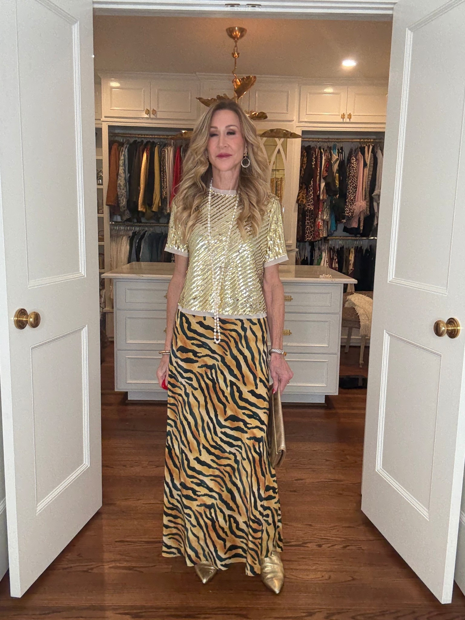 Holiday Style from Hunter Bell!  Shirt sleeve gold sequined top paired with a zebra print skirt and gold boots!


#LTKShoeCrush #LTKStyleTip #LTKHoliday