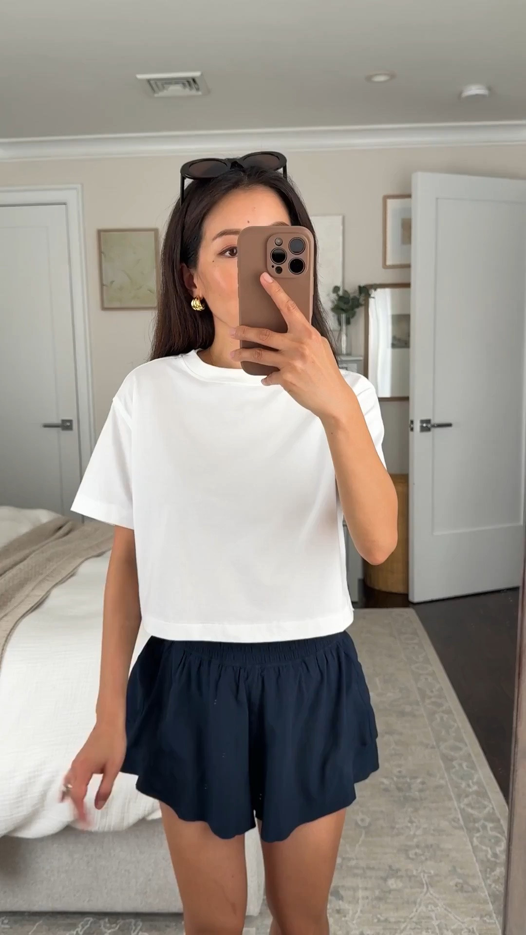 Sizing info below! 
• All Yours Organic Cotton Cropped T-Shirt xxs. Soft but has some boxy structure and the length is great for still showing the waistline but doesn’t show my skin. 
• High-rise flutter shorts size XS. I sized up. XS waist measures 24” when not stretched. 
• Madewell sunglasses 

Athleisure, walks, easy mom style, running errands

#LTKPetite #LTKActive #LTKmomlife
