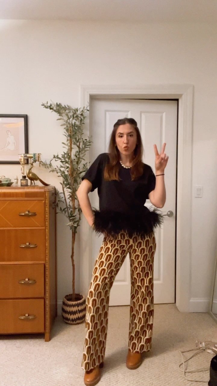 Just a basic t-shit out tonight 🪩🦢💃

Veronica beard feather t shirt, Zara 70s print flare pants and the vest Tory Burch boots 💃 

#LTKStyleTip #LTKShoeCrush #LTKFestival