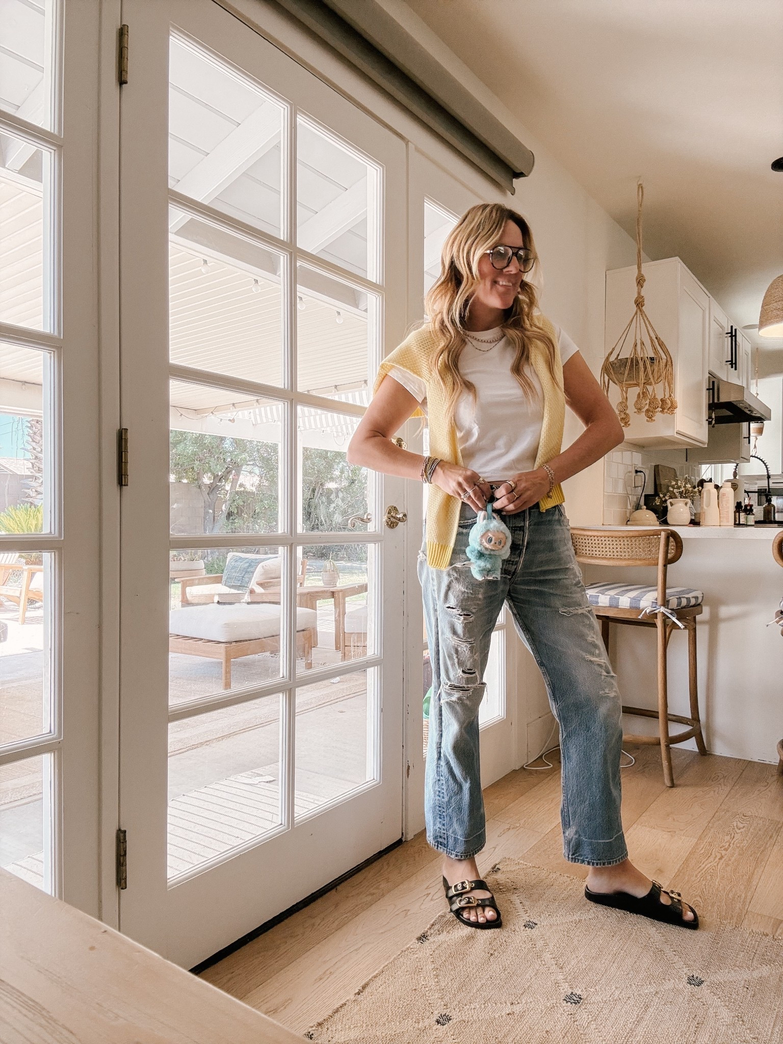 Off to the movies in 116° but pants and a cashmere sweater are a must bc why do the theaters insist on making it feel like the artic. And are you a in or out in the labubu trend?

#LTKOver40 #LTKStyleTip #LTKSeasonal