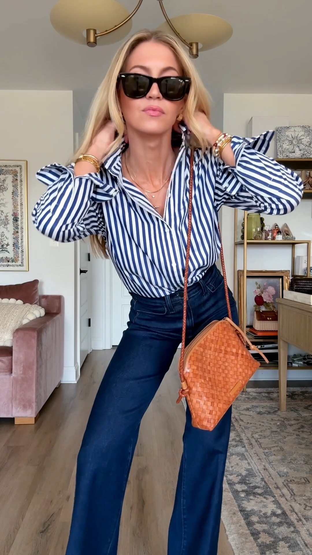 Classic striped button up with some of the most flattering high-rise, wide leg denim jeans that I own.

Striped Ralph Lauren button up: TTS, wearing a S
Dark denim high-rise wide leg jeans: TTS, wearing a 25
Cognac Brown kitten mule sandals: TTS


Woven cognac Brown Crossbody bag, Ray-Ban black sunglasses, classic style

#LTKgrwm #LTKdayinmylife #LTKSeasonal