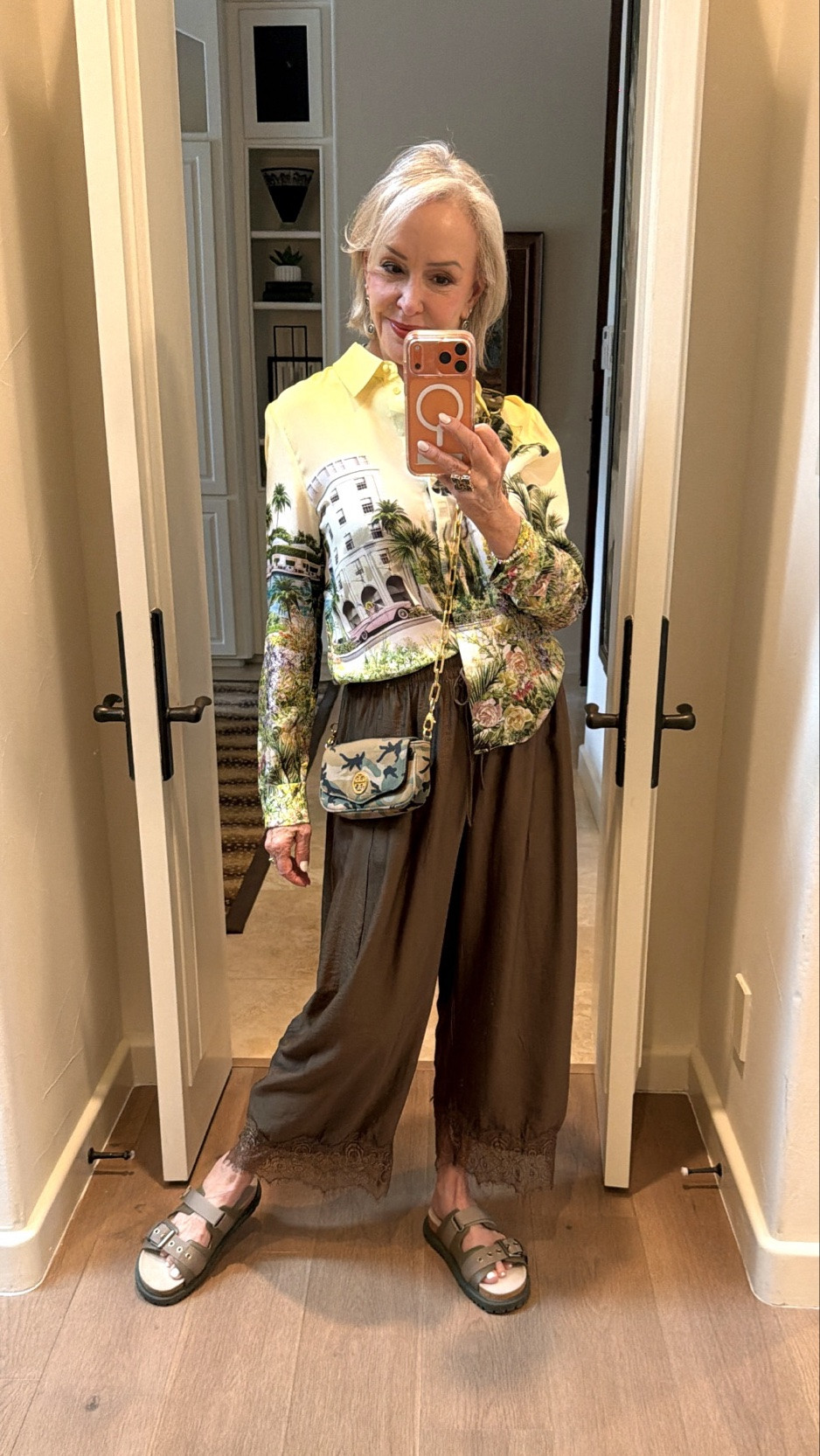Women's Pants Cropped Lace Hem Pants Summer Boho Drawstring High Rise Wide Leg Lounge Trousers with Pockets. Comes in several colors. I am wearing a size small. Runs tts.

signature Alice and Olivia  print reimagined into a world of pure paradise, bringing personality to a classic silhouette. A hidden placket keeps the finish clean, allowing the print to remain the focal point. Lightweight and fluid, it pairs effortlessly with denim or tailoring.
Tropical print, vintage Miami Beach print, 
Dior slides
Old Tory Burch crossbody

#LTKOver40 #LTKTravel #LTKootd