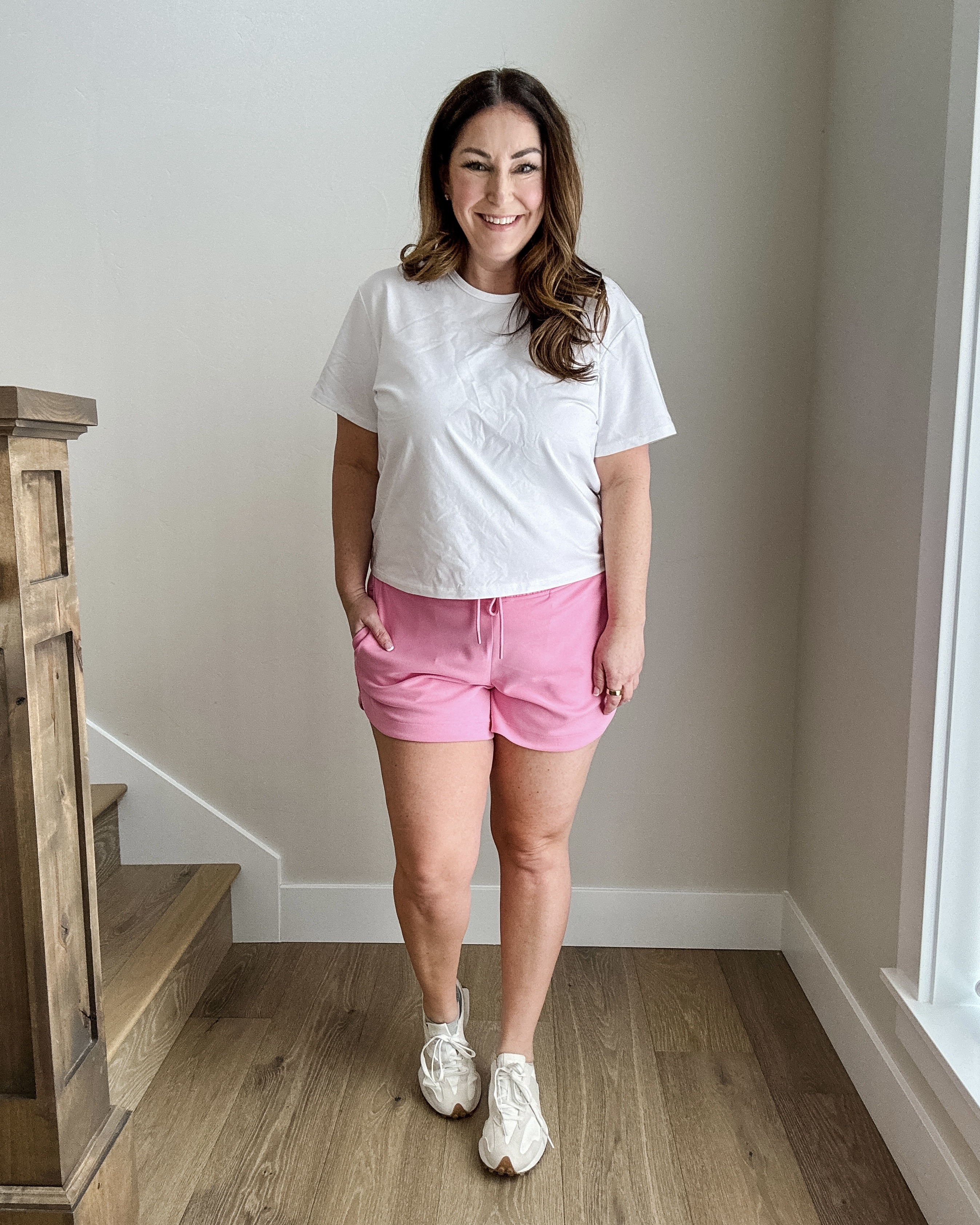 Athleta Seasoft Mid Rise 4" shorts in pink with white essential tee.  Wearing L in both 

 

#LTKSeasonal #LTKActive #LTKMidsize