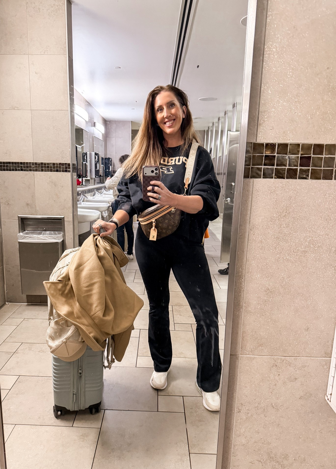If you don’t post a bathroom mirror selfie from your departing airport did you even fly?
Featuring a dirty mirror and me trying block the cleaning cart behind me😎

#LTKTravel #LTKTall #LTKootd