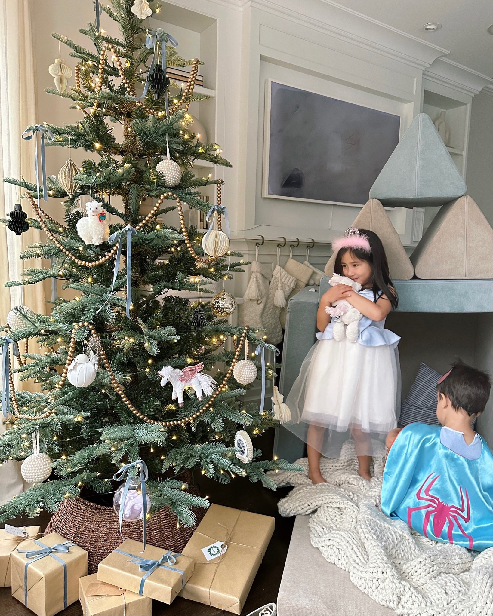 Love our tree so much! It was a small splurge but am so happy with the quality, and more rustic realistic look. Will def be using it for many years to come 

• 7 foot king noble fir with lights. 

• nori’s dress is Janie and Jack size 3 and she’s worn it for over 2 years so def got its values worth! Gap makes a Shorter Disney princess sweater dress that’s great , we have all of them 

• decorations are from over the years, some target / amazon finds too 

The $3 sequined unicorns are so cute and a hit with the kids!

• tree collar is  home goods find 

Christmas holiday home decor 

#LTKhome #LTKSeasonal #LTKHoliday