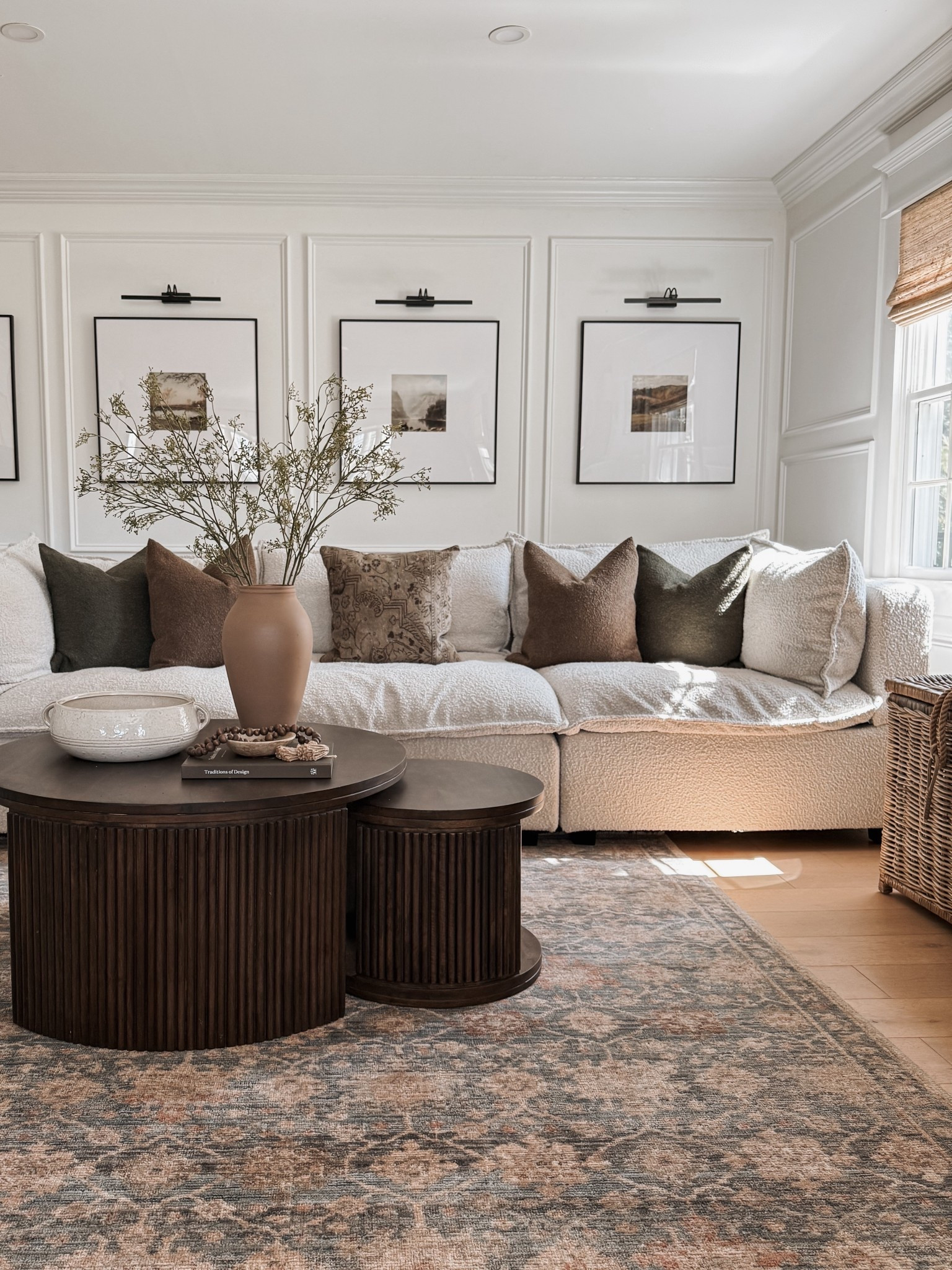 Living room boucle sofa, area rug, nesting coffee tables, wall decor, textured pillows, artificial branches, window shades, table decor, vase. 



#LTKdayinmylife #LTKSaleAlert #LTKHome