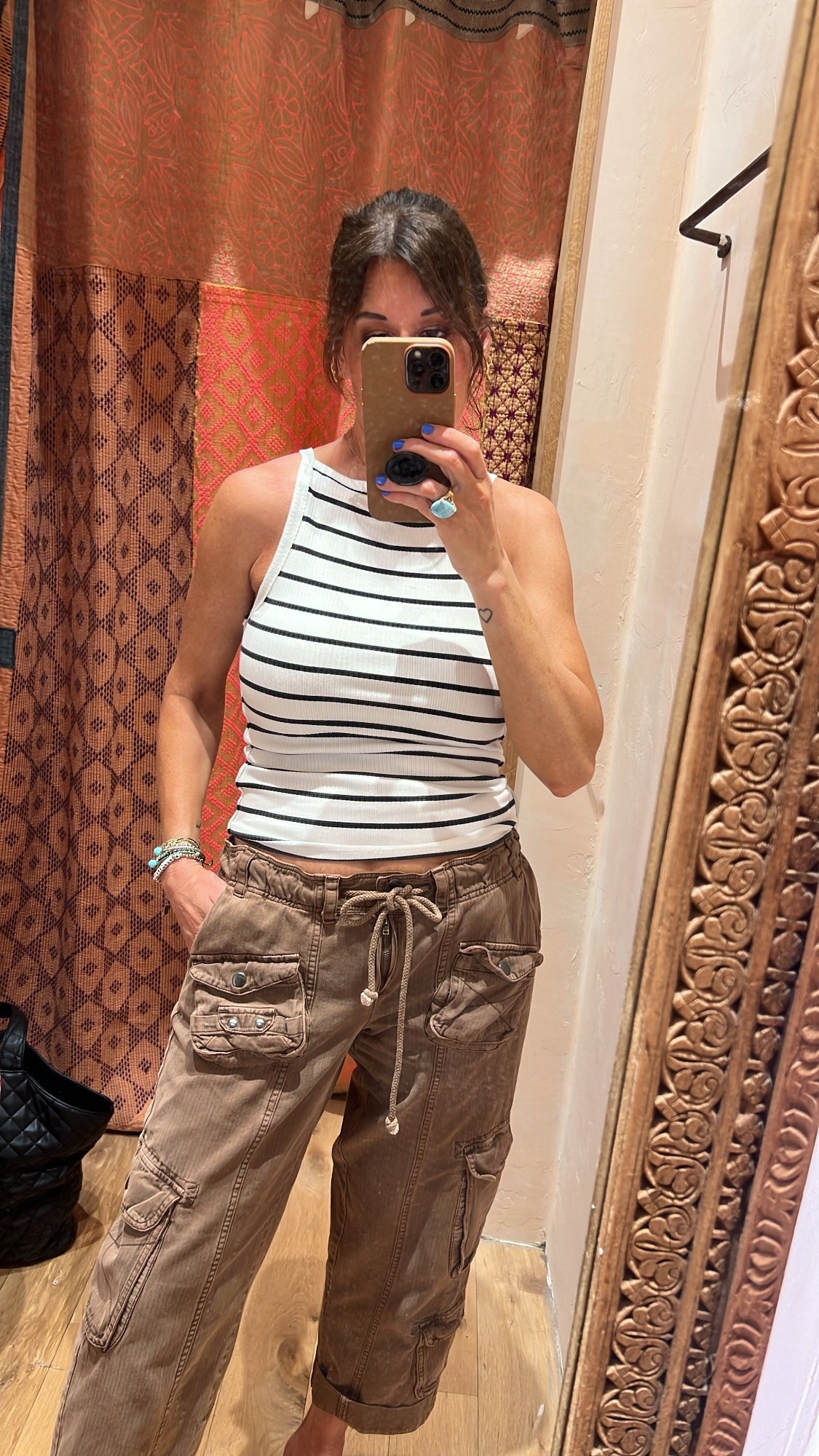 Free People tank.  Wearing size small  

#LTKFindsUnder50 #LTKOver40