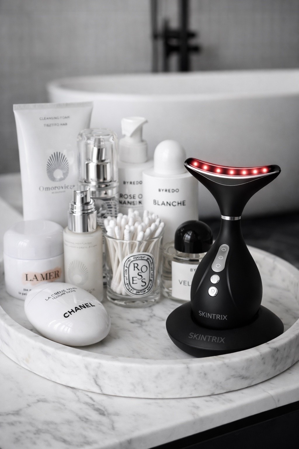 High-end skincare aesthetic featuring a marble vanity tray styled with luxury beauty essentials and a modern LED face device. Clean black-and-white contrast, minimal packaging, and spa-inspired styling create a premium, Pinterest-worthy beauty moment. Perfect inspiration for modern bathroom counters, vanity organization, and elevated self-care rituals.

#luxuryskincare #beautysetup #ledfacedevice #modernvanity #marbledecor #skincareroutine #highendaesthetic #selfcareritual #beautyinspo #minimalbeauty #ltkbeauty #pinterestbeauty #vanitygoals #beautycorner #skincareaddict