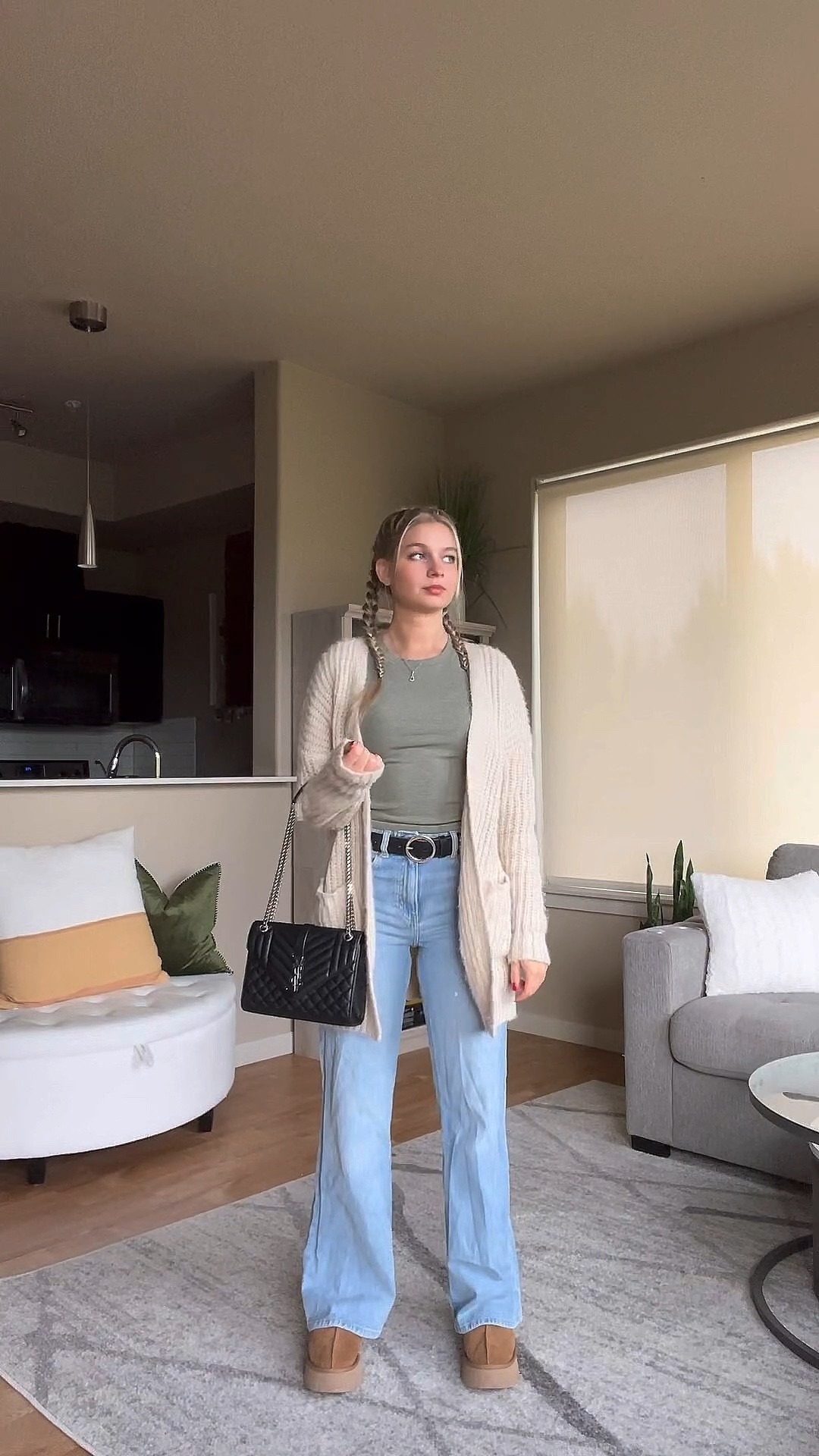 Easy cozy casual outfit. 🧸 I am wearing my favorite tee by vuori. They are an athletic brand and the fit is so flattering. The jeans are from H&M and they are currently my most worn. Comfortable and stylish. The cardigan is from Tilly’s and don’t have the link anymore. Can’t forget the timeless YSL bag and the trendy Uggs. 🥰

#LTKstyletip #LTKSeasonal #LTKVideo