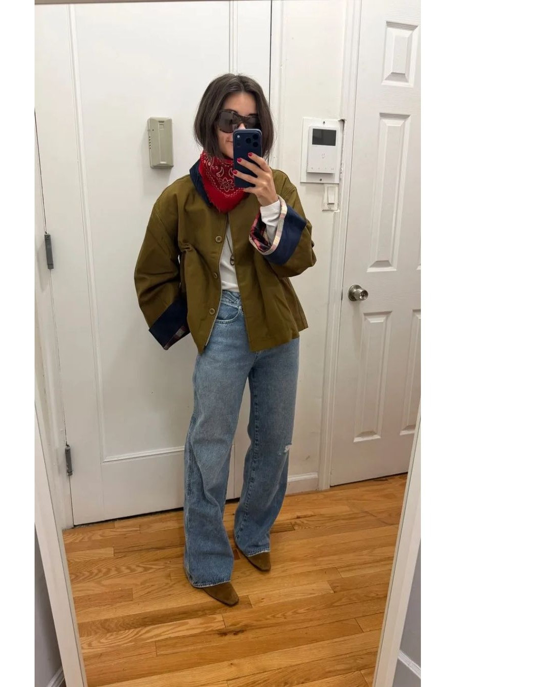 Jeans and a tee, with a few fall finishing touches. Dana’s original outfit photo brings together an olive barn jacket, light denim, a red scarf and brown boots.

Shop current pieces and similar options below, including extra tee, bag and belt options from this collection. Tags marked Similar are styling alternatives, not a claim that every linked item is the exact piece worn.

The linked jacket, jeans and boots may differ in shade or wash. YDAOWKN aviators replace the Era glasses; Madewell’s striped silk bandana replaces the paisley scarf. The belt is narrower suede instead of smooth leather. The optional J.Crew striped tee has ballet sleeves in Red Blue Multi (XXS/XS available when posted; final sale). QUINN is now listed in Vintage Jersey; the Organic Basics tee is the current True Heavy version. The Beau necklace is not linked.

Affiliate links: I may earn a commission from purchases. More outfits: https://www.itscasualblog.com/ 

 