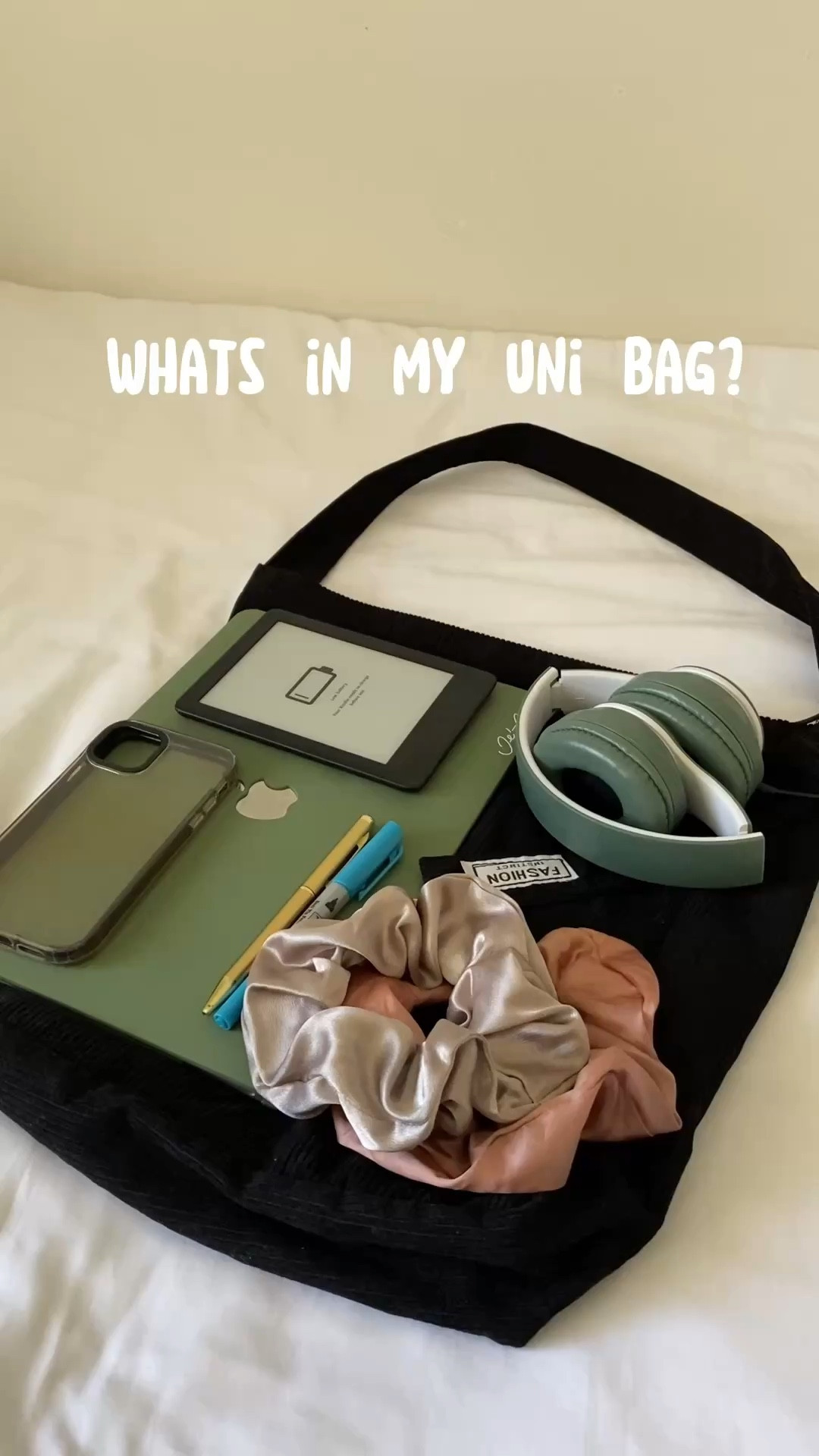Inside my uni bag 🎒 From tech to tiny essentials: MacBook Pro, satin scrunchies, headphones, Kindle, pen, and more. 

Want me to film an updated one next? 👀

#LTKItBag #LTKU #LTKSaleAlert