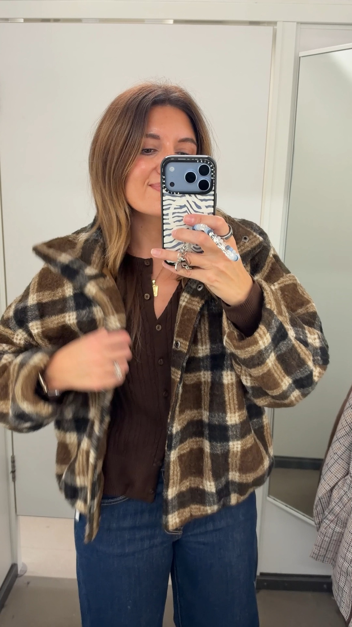 Am I in Abercrombie or Old Navy?!! I’m 5’7” in a size 4 jeans, small cardigan and plaid jacket. Currently on sale!