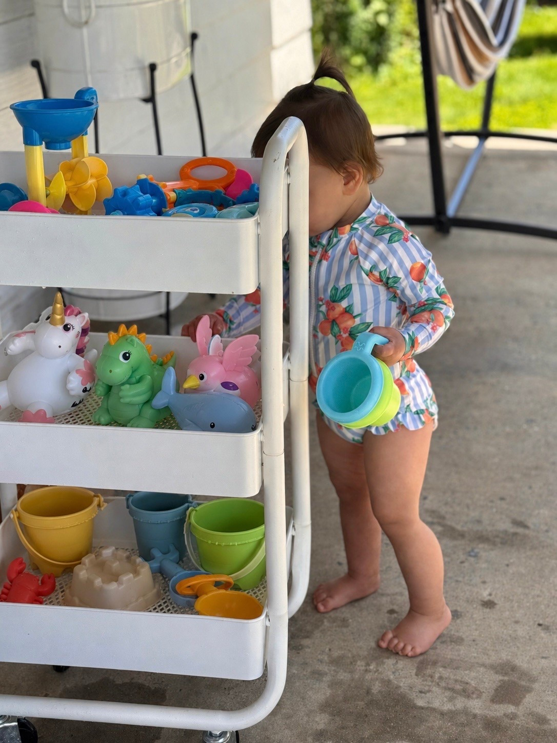 If there's one outdoor play item that's made our summer easier, it's this cart.

I originally bought it as a simple way to organize Monroe's water table toys, but it has become one of our most-used outdoor essentials. She can see all of her toys at a glance, grab what she wants independently, and put things back when she's done without needing my help every few minutes.

I love that I can switch out the contents depending on the season or activity. Water table toys on top, whimsical inflatables in the middle, sand toys on the bottom—or completely change it up whenever I want.

It's lightweight, easy to wheel from the backyard to the front yard, and honestly makes outdoor play feel so much more organized. 
One unexpected bonus? After water play, I just leave the cart in the sun and everything dries naturally. No soggy toy bins, no forgotten puddles of water, and no ruined toys.

Simple, functional, and one of those purchases I wish I had sooner. Shop the exact link below! 🐬


#LTKFamily
#PlayroomOrganization
#ToyOrganization
#OrganizedMomLife
#MomLifeSimplified
#OutdoorPlay
#OutdoorPlayIdeas
#WaterPlay
#WaterTableFun
#SummerPlay
#SummerWithKids
#ToddlerActivities
#ToddlerMomLife
#MontessoriAtHome
#OpenEndedPlay
#WhimsicalChildhood
#ChildhoodUnplugged
#SimpleChildhood
#IntentionalParenting
#MotherhoodUnplugged
#MagicOfChildhood
#BackyardPlay
#BackyardChildhood
#PlayBasedLearning
#KidsOutdoorActivities
#MomFinds
#HomeOrganizationIdeas
#ToyStorageSolutions

#LTKHome #LTKKids #LTKKids #LTKSwim #LTKHome