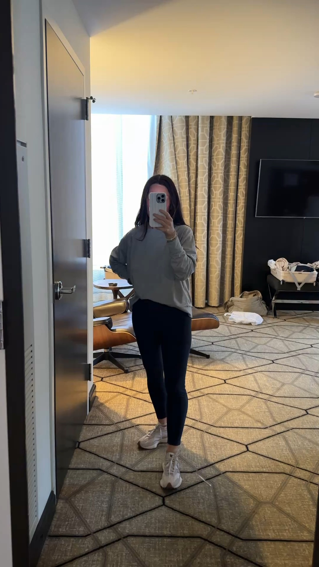 The kind of casual fall outfit I could wear on repeat! An oversized gray sweatshirt, black leggings, and neutral sneakers make the easiest comfortable everyday outfit for running errands, travel days, coffee runs, or a casual weekend. I love a simple athleisure look that feels relaxed but still looks put together, and this sweatshirt and leggings combination is such an easy outfit formula to recreate. Fall outfits women over 50. If you’re looking for casual fall outfits for women, comfortable mom outfits, leggings outfit ideas, or everyday athleisure style, this is a great one to save! Shop my sweatshirt, leggings, and sneakers linked here on LTK.

#FallOutfitIdeas #CasualOutfitIdeas #AthleisureOutfit #LeggingsOutfit #EverydayStyle