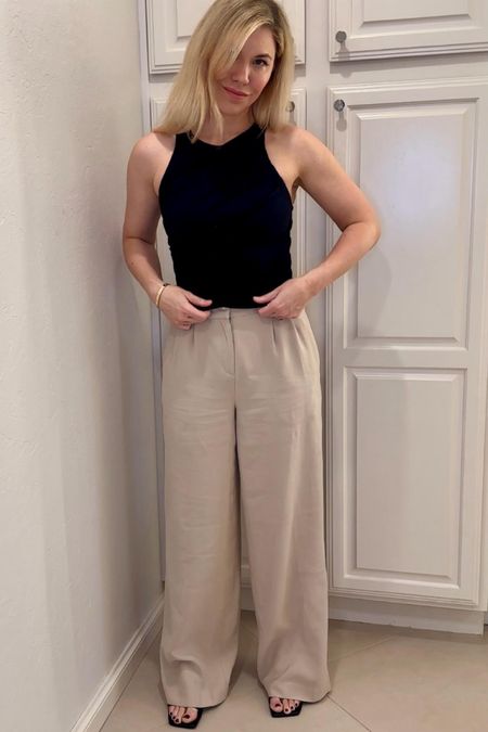 Pleated pants 
Black top

Summer outfit 
Summer dress 
Vacation outfit
Vacation dress
Date night outfit
#Itkseasonal
#Itkover40
#Itku


#LTKFindsUnder100 #LTKFindsUnder50