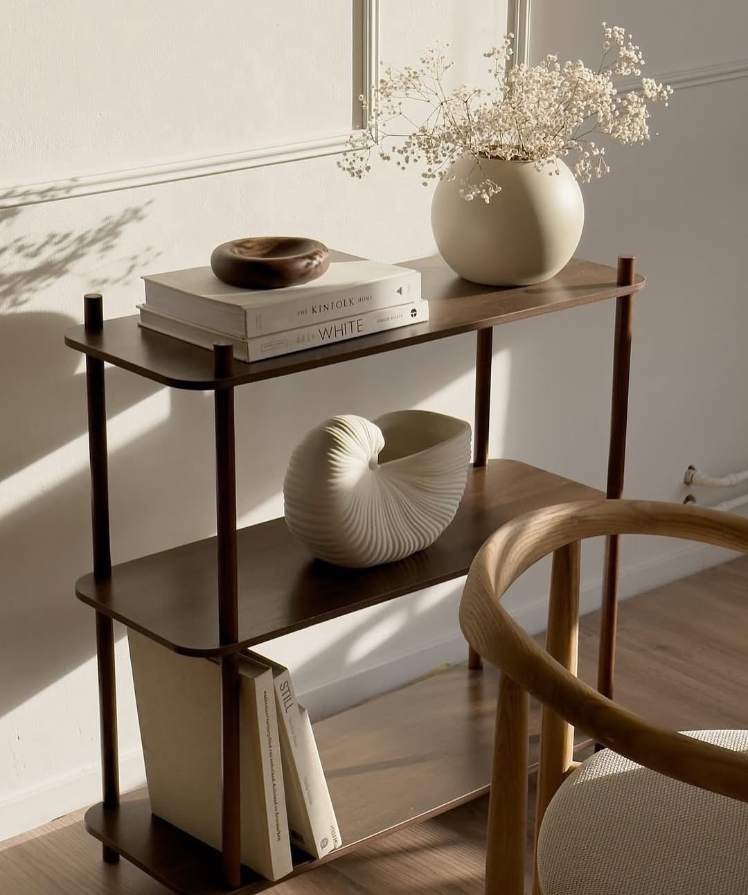 A quiet corner where light, texture, and simplicity come together. ✨
I’m obsessed with how neutral tones and sculptural shapes create such a peaceful vibe. This wooden shelf adds warmth, while the ceramic vase and shell-inspired piece bring in soft, organic contrast.
It’s the little details — a stack of curated books, a wooden bowl, dried florals — that make a space feel intentional and lived in.
This is your sign to slow down and style a shelf that feels like you. 🤍
Soft, serene, and minimal — just the way I like it.

#ShelfStyling #MinimalistDecor #NeutralHome #InteriorInspo #CalmVibes #SoftAesthetic #ScandiStyle #HomeStyling #ModernDecor #WabiSabiVibes #NeutralPalette #DesignLovers #CozyCorner #DecorGoals #WonenMetLef

#LTKSaleAlert #LTKSeasonal #LTKHome