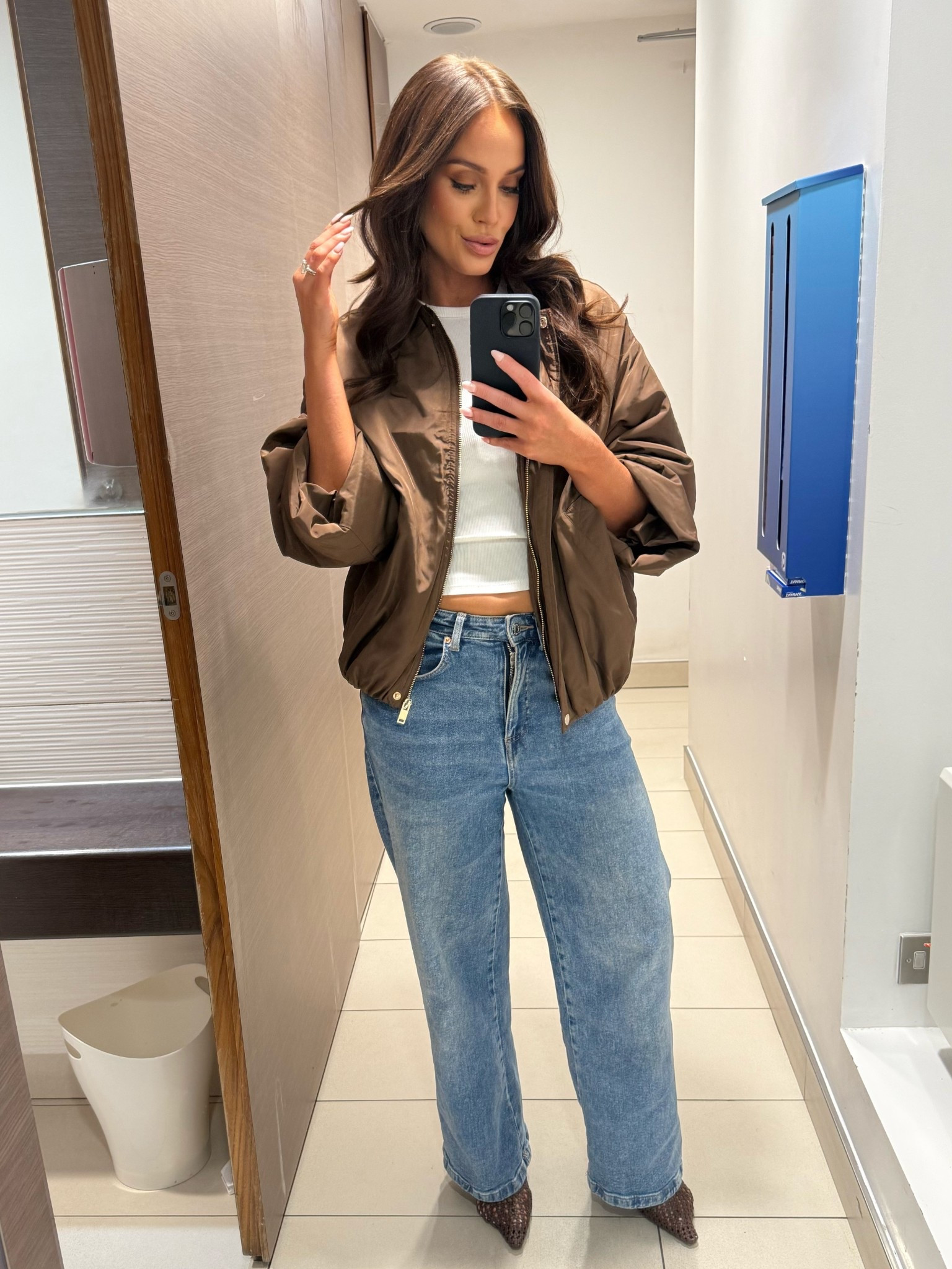 Brown bomber jacket, wide leg jeans and brown woven slingbacks. 

#LTKuk #LTKworkwear #LTKautumn