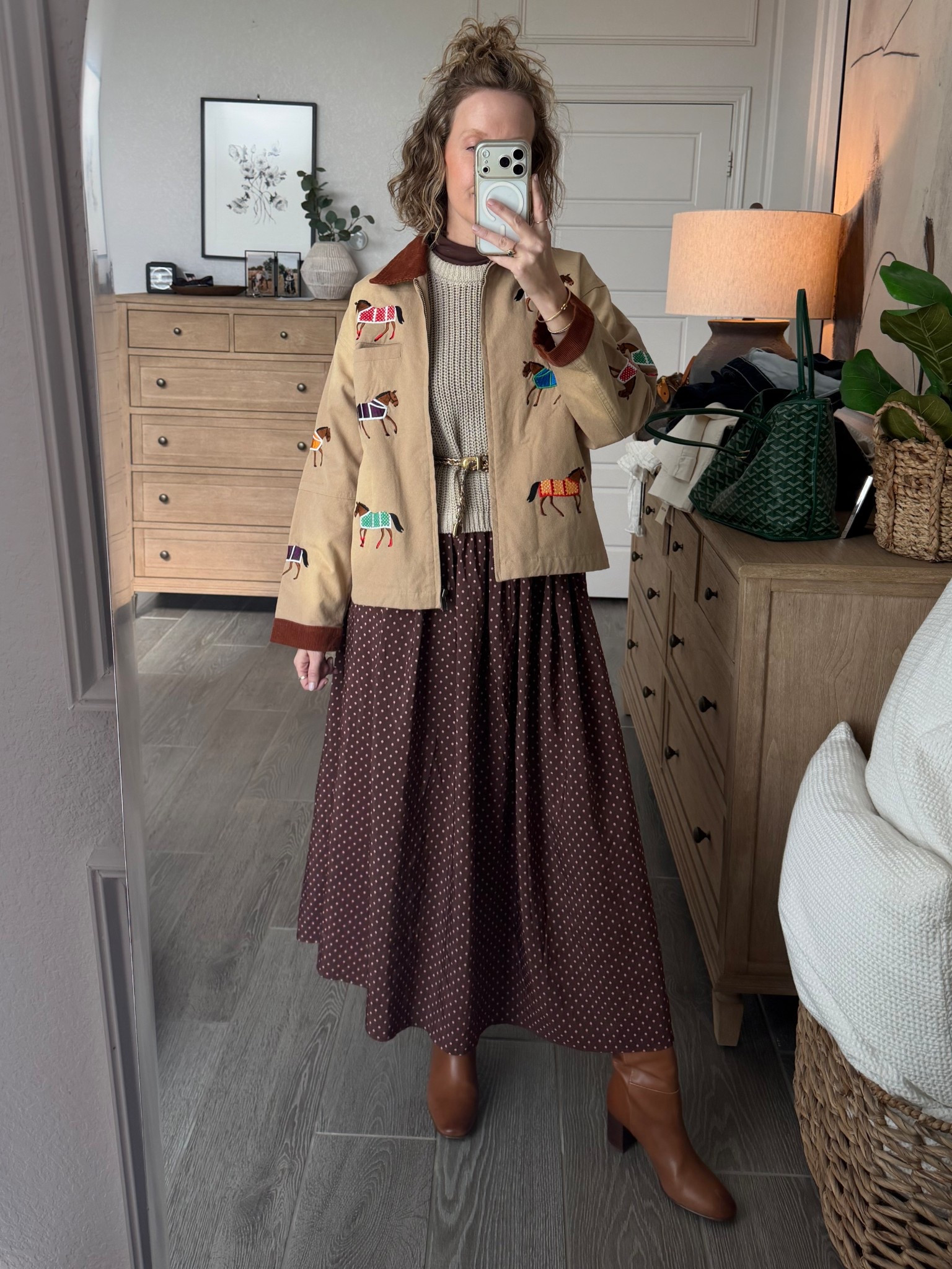 Jacket is by Found rented from Nuuly (wearing a small). Wearing a small in the Anthro dress. 