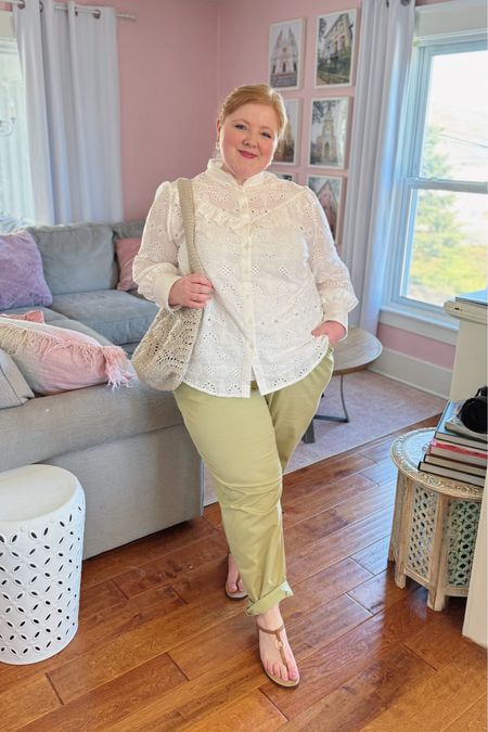 Casual spring outfit from Ulla Popken featuring an eyelet white top in size 20/22 and these green khaki pants in the size 20 which are too big. Size down in the pants. My measurements are 47-39-51. Save 25% at Ulla Popken with my code 2024LIZ25.