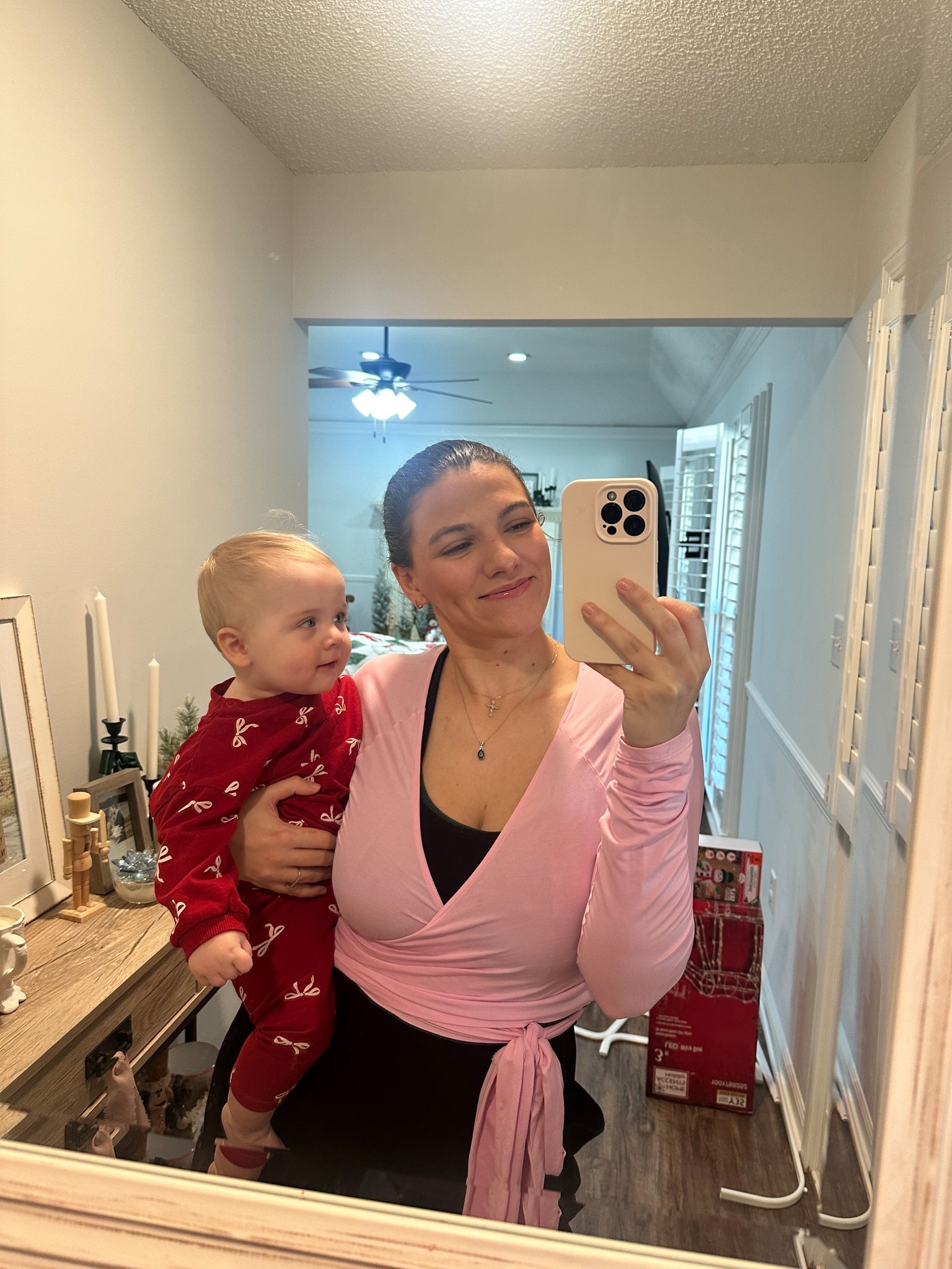 Casual jumpsuit mom outfit with the prettiest pink wrap activewear top! Baby girl is wearing a bow printed sweatshirt and sweatpants from H&M 

#LTKHoliday #LTKFamily #LTKBaby
