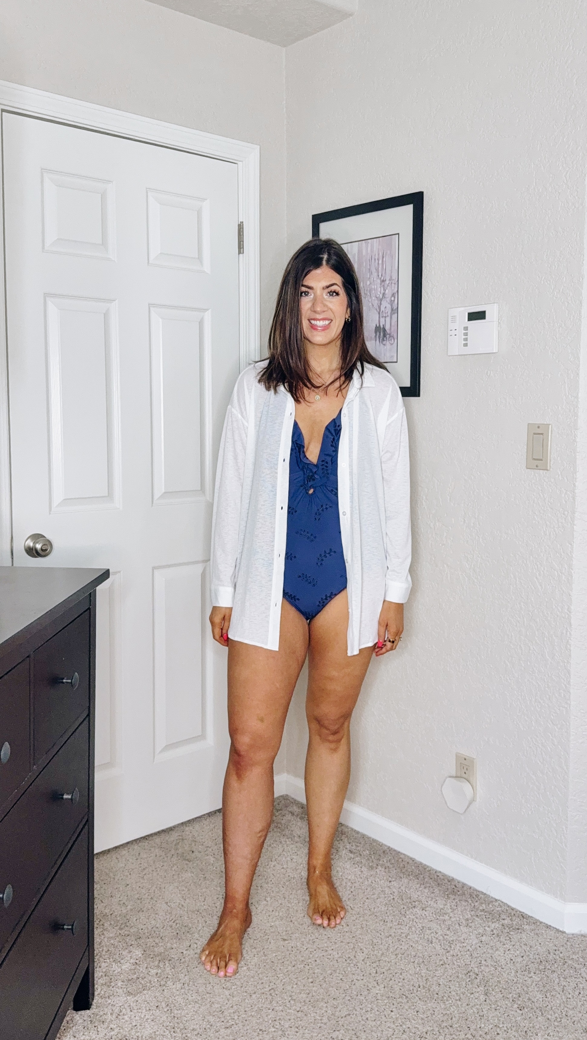 In a large eyelet swimsuit
In a medium swim cover 

#LTKMidsize #LTKFindsUnder50 #LTKSwim