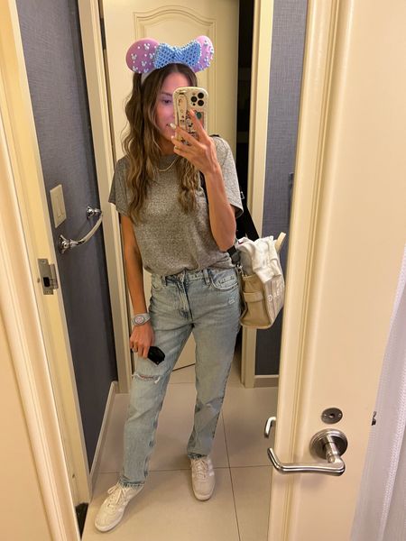 Disney OOTD ❤️  my jeans are TTS and under $30 and my shirt is under $15! These are two of my go to basic pieces and both so comfy for a full day walking around. 

Spring style; mom style; spring outfit; casual outfit; spring break outfit; travel outfit; Walmart fashion; H&M; straight leg denim; adidas; Marc jacobs; Christine Andrew 

#LTKstyletip #LTKtravel #LTKSeasonal
