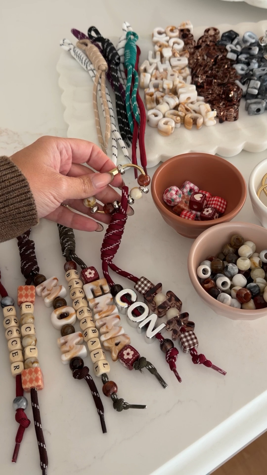 Everyone’s favorite summer craft just got a fall makeover 🍂🤎
Paracord keychains, but in all the warm, cozy colors of fall and I’m officially convinced we need to keep craft nights going all year long. So easy, so cute, and the perfect excuse for a fall craft night with the girls.

Save this one for your fall craft list! 🍁

#LTKSeasonal #LTKHome #LTKmomlife