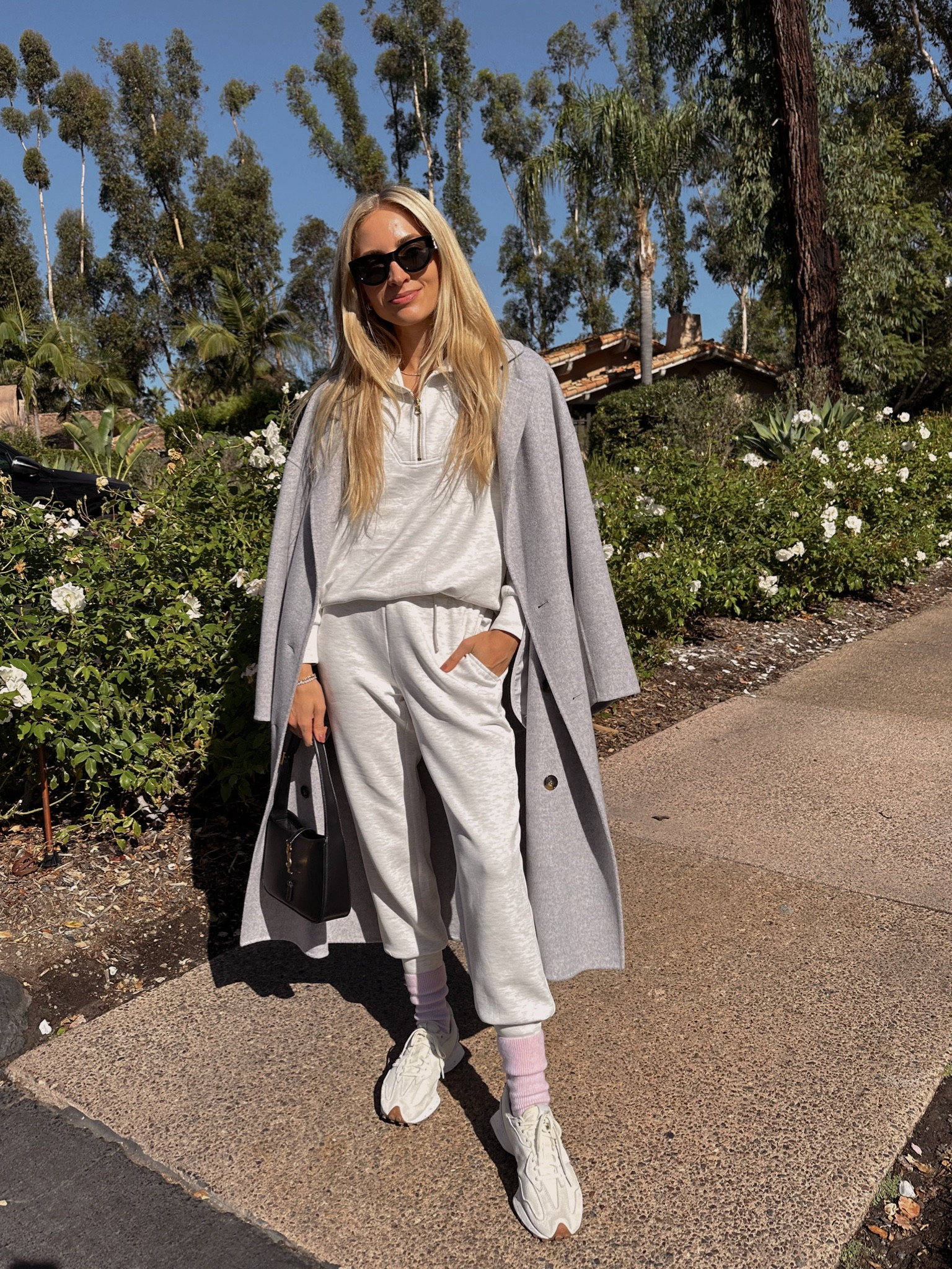 Lazy breakfast look at Rancho Valencia this AM: coziest grey Varley half zip sweatshirt and sweatpants (this is the best lounge set!), cashmere socks, sneakers and a grey coat. 

Sizes worn here:
Sweatshirt XS (true to size but relaxed)
Sweatpants XS (true to size but relaxed)
Coat XS (runs oversized!)

#LTKSeasonal #LTKtravel #LTKstyletip