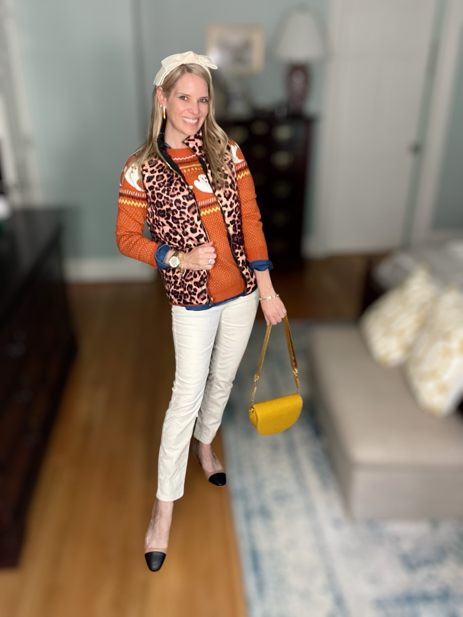 Fall layers but make them festive 🎃👻 I styled this cozy ghost print turtleneck sweater with a classic denim button-down shirt underneath for a preppy base, then added stretch corduroy leggings for comfort and warmth. The leopard quilted vest adds the perfect bold layer, while my ivory bow headband and candy corn earrings bring in those playful Halloween details. 🧡

Finished the look with a chic yellow crossbody bag + timeless accessories like my two-tone watch for a polished touch. This outfit works perfectly for pumpkin patches, school parties, or just cozy October days where you want to feel seasonal and stylish.

🛍️ Shop my full look below—Amazon, Talbots, Walmart, and BaubleBar finds all mixed together for a fun, affordable fall outfit!

✨ Keywords: Halloween sweater outfit, ghost print sweater, cozy fall layers, leopard vest outfit, corduroy leggings fall style, festive Halloween outfit for moms, candy corn earrings BaubleBar, affordable fall fashion finds, preppy layered fall outfit


#LTKFindsUnder50 #LTKFindsUnder100 #LTKItBag

#LTKFindsUnder50 #LTKFindsUnder100 #LTKItBag