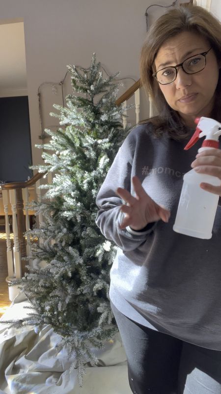 First step in flocking is to spray your branch with water.  Get a few water spray bottles, you are going to need them.

#LTKhome #LTKHoliday #LTKSeasonal