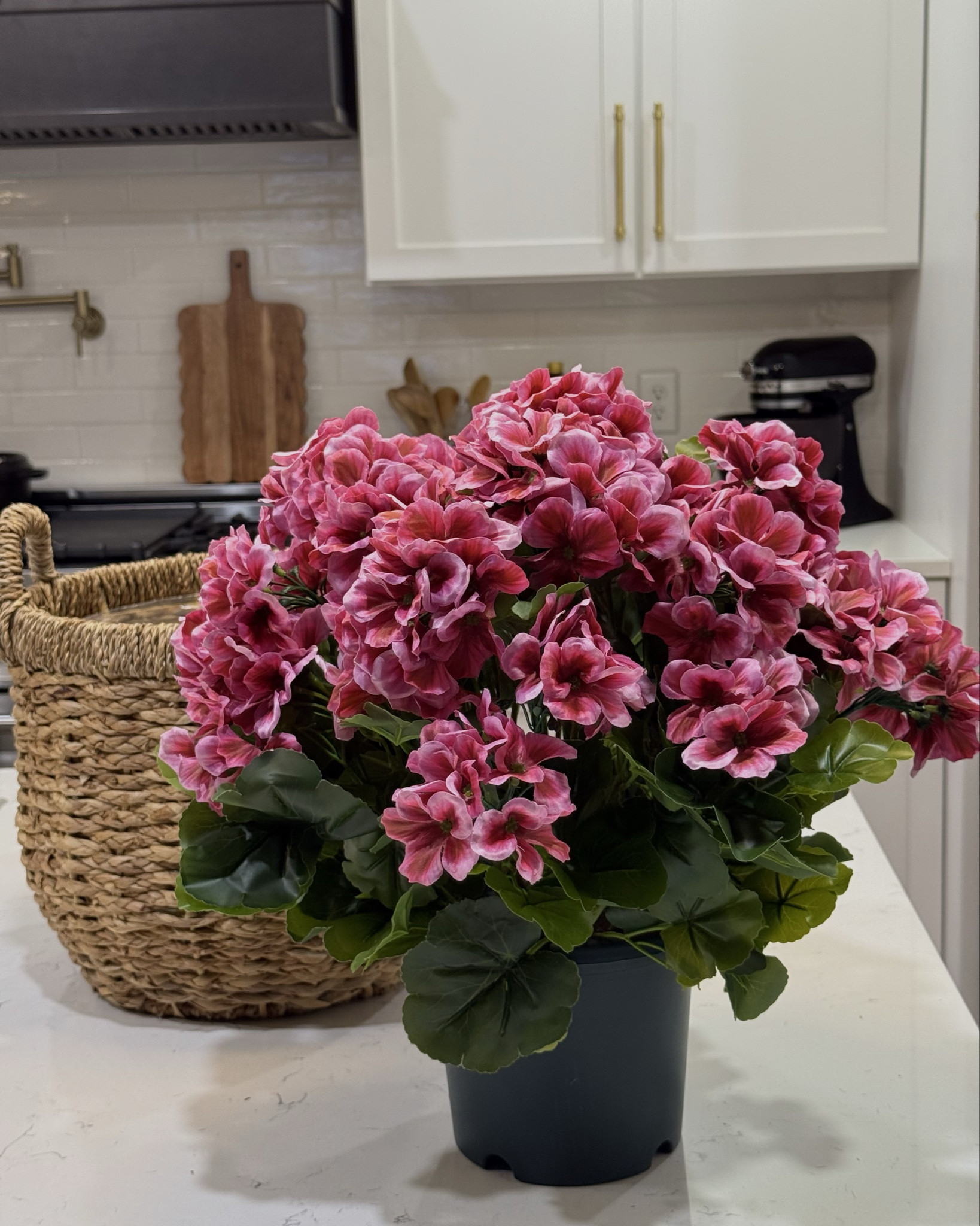 I like taking a chance on new things and trying them out so you don't have to. I love faux stems, but this is the first time I've tried potted artificial flowers. These pink geraniums are gorgeous! I love the fullness of them  They also come in red. I think the planter you use is just as important in elevating the look of the flowers, like this rattan planter basket.🌿🌺🧺

#LTKHome #LTKSeasonal