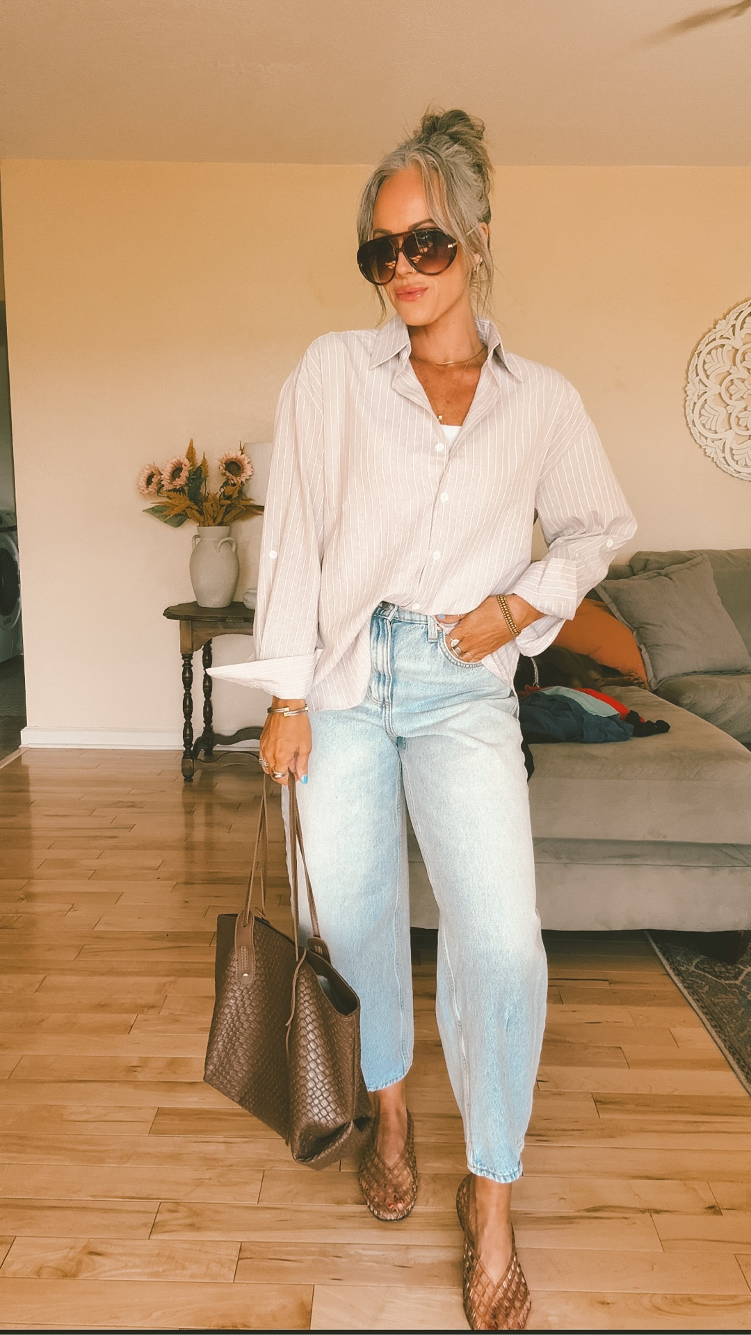 These button-down tops are the perfect oversized fit, I am in my true size small. I am in a medium in the tank top and my true size 4 in the pants. Wardrobe staple!! ￼#wardrobestaple #closetmusthave #buttondowntop #barreljeans #momstyle #outfitidea 

#LTKootd #LTKOver40 #LTKmomlife