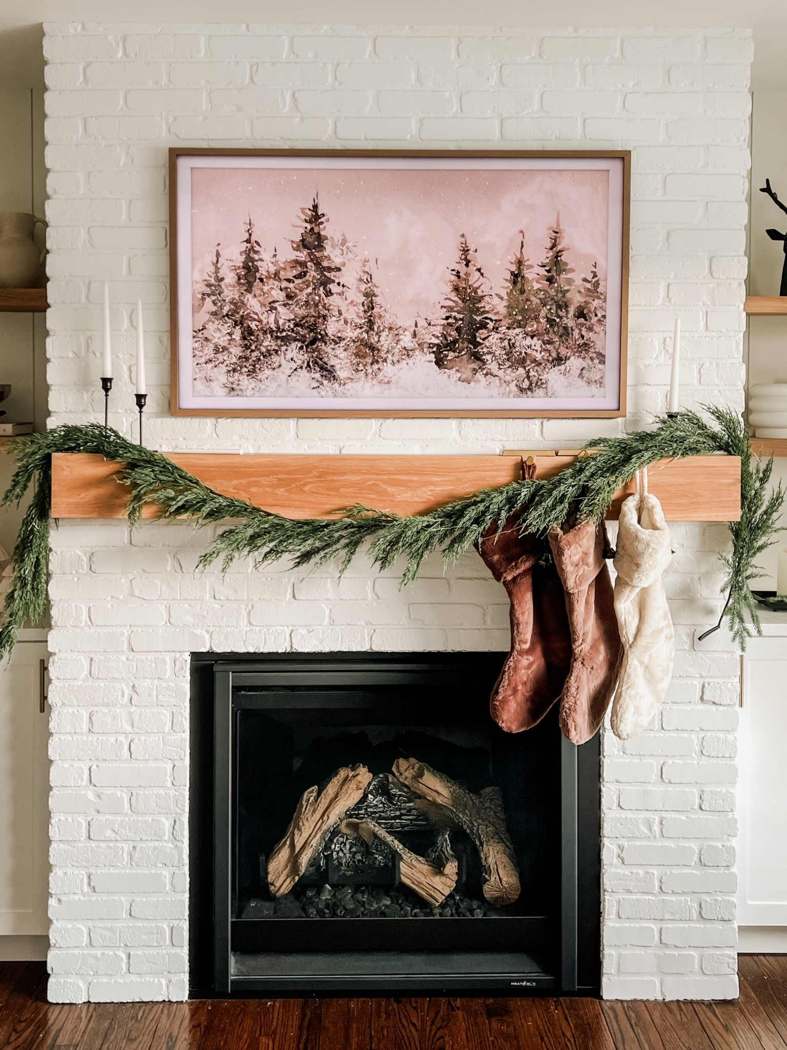 Best frame tv art is from Collection Prints, started by one of my favorite home creators to follow, Halfway Wholeistic. They run sales often (often 50-75% off!). I love the seasonal bundles, and swap out my artwork quarterly. Garland and stockings are Tjmaxx finds. #neutral aesthetic transitional modern farmhouse frame tv art unique classic timeless organic

#LTKHome #LTKFindsUnder50