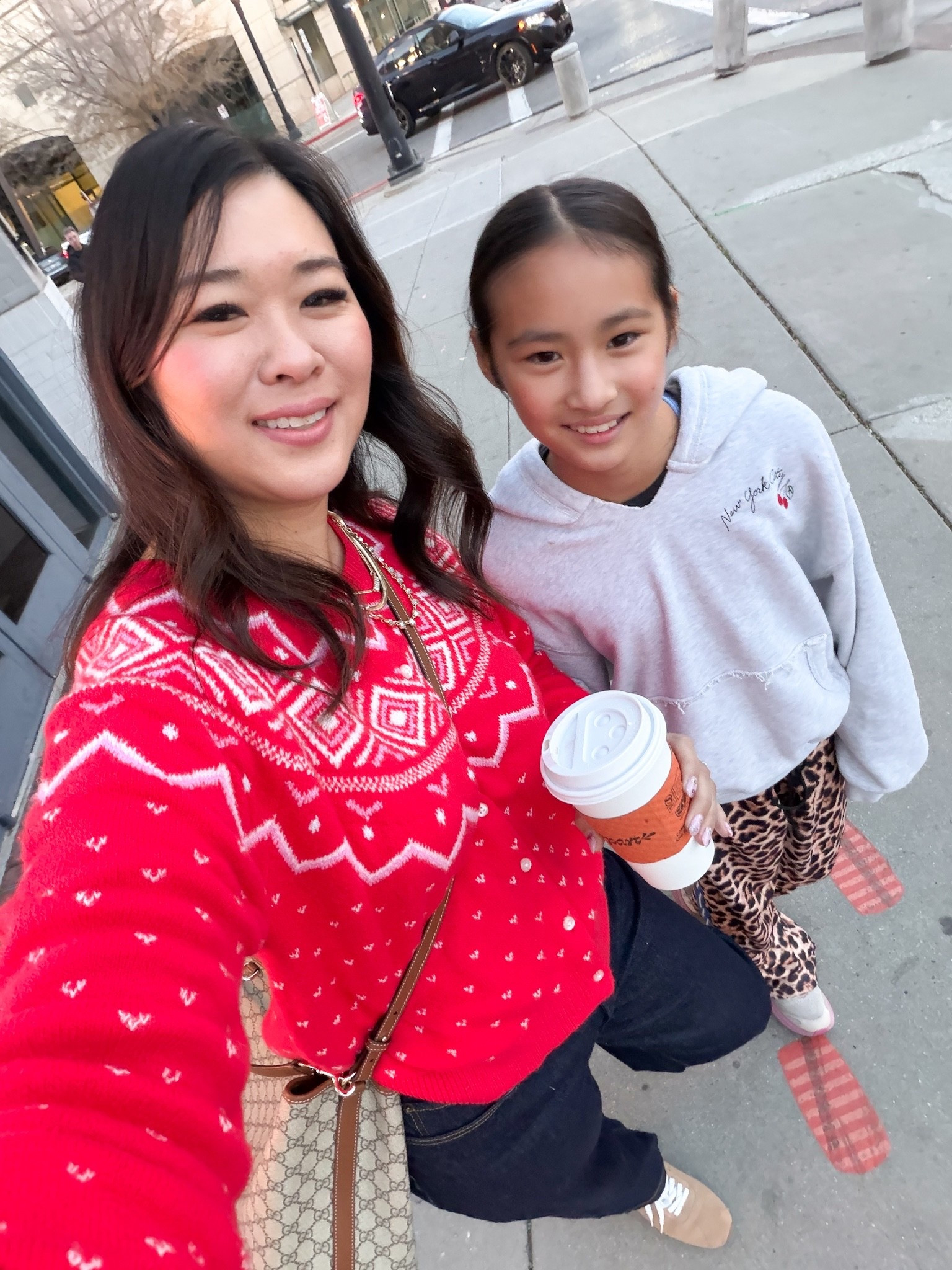 My red sweater: Medium
Barrel jeans: 8

Vivian’s NYC sweatshirt (sold out) but linking similar from Abercrombie 
Leopard pants: XS (still a tad big on her)