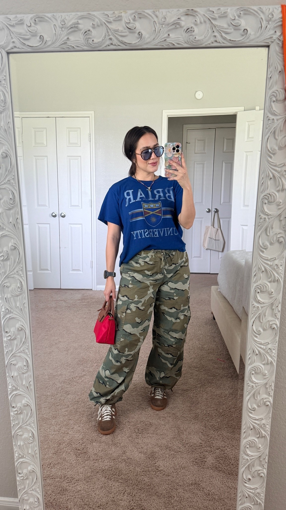 Outfit of the day as a 5’1” and curvy mom. Cargo pants are size small. Top is size medium. Linked similar items for bag and sunnies 

American eagle cargo camo pants 
Briar university tee
Off campus gear

#LTKootd #LTKmomlife #LTKPetite